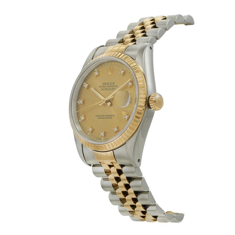 A classic example of Rolex’s most iconic dress watch, this 1991 Rolex Datejust Ref. 16233 features a 36mm stainless steel case paired with an 18KT yellow gold fluted bezel and two-tone Jubilee bracelet. The factory champagne dial is set with diamond