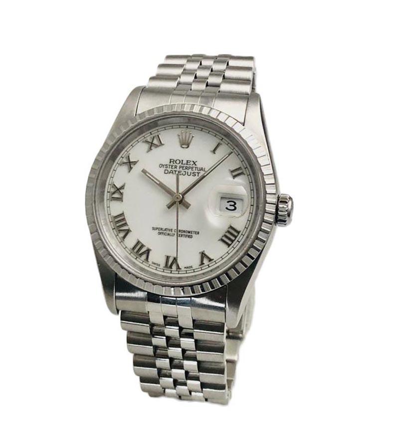 Brand: Rolex

Reference: 16220

Case Size: 36 mm

Movement: Automatic

Functions: Hours, Seconds, Minutes, Day, Date

Case Material: Stainless Steel

Bezel:  Fluted

Dial Color: White

Band Type: Stainless Steel

Signature: Rolex

