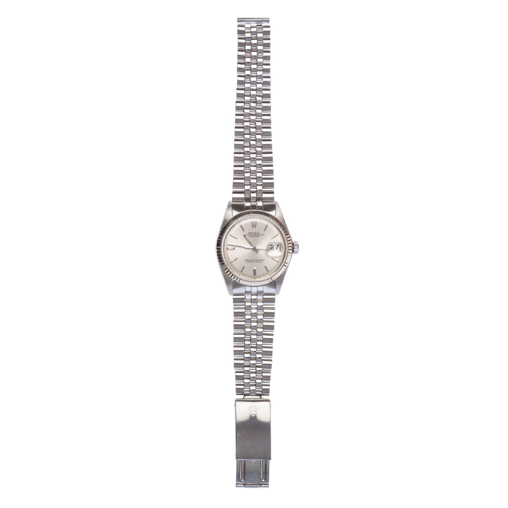 Brand:​ ​Rolex
Model:​ ​Datejust
Reference:​ ​1601
Dial:​ ​Silver​ ​sunburst
Date:​ ​Yes,​ ​at​ ​three​ ​o'clock
Movement:​ ​Rolex​ ​mechanical​ ​automatic
Case:​ ​Steel,​ ​no.​ ​3924344
Year:​ ​Circa​ ​1975
Diameter:​ ​36​ ​mm
Bracelet:​ ​Rolex​