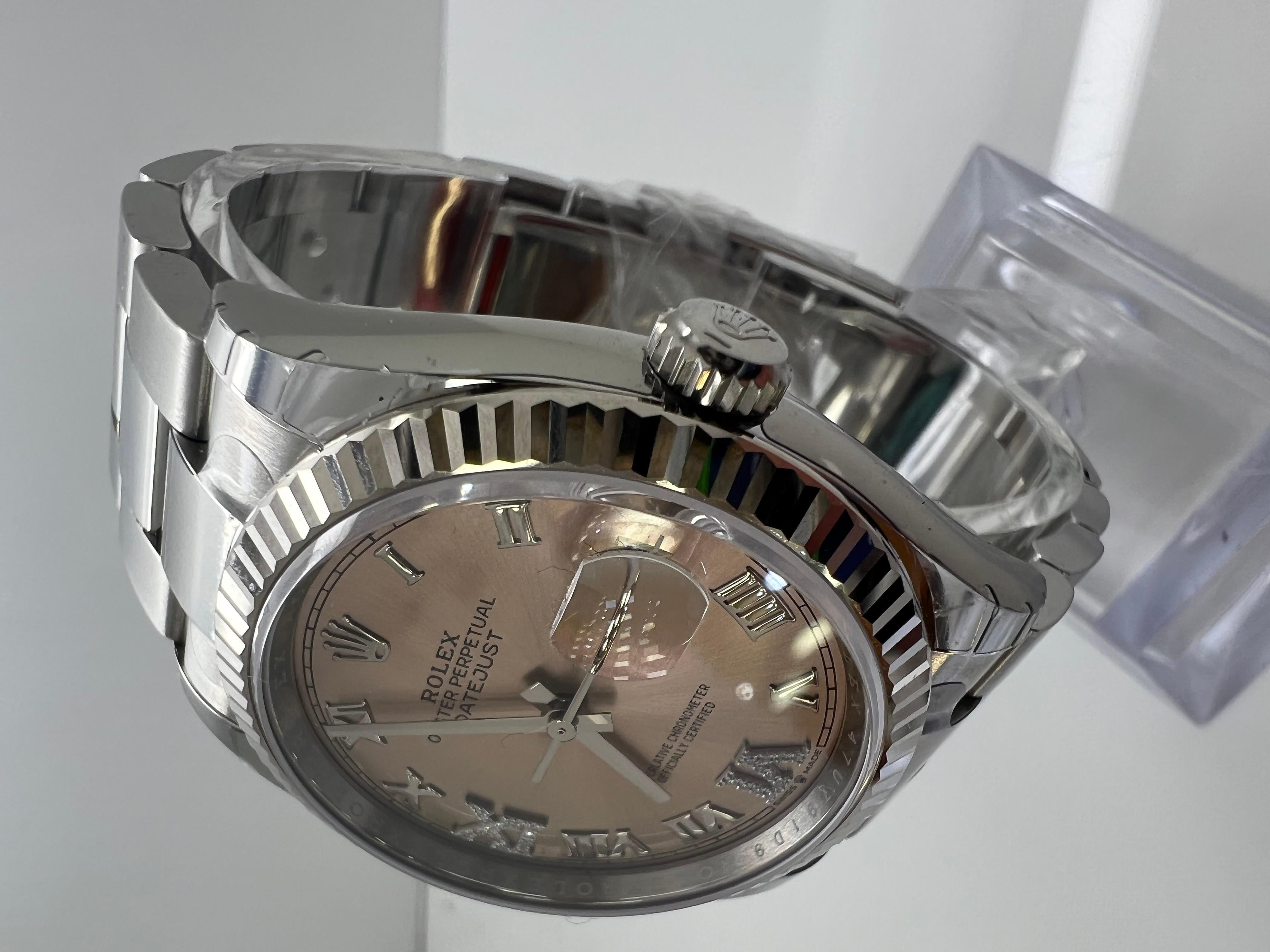 Rolex Datejust 36mm Pink Diamond Roman Watch New

New 2021 unworn

All Original Rolex parts

Factory Diamond Dial

Original Box and Papers

4 year warranty

Shop with confidence

Evita Diamonds & Timepieces