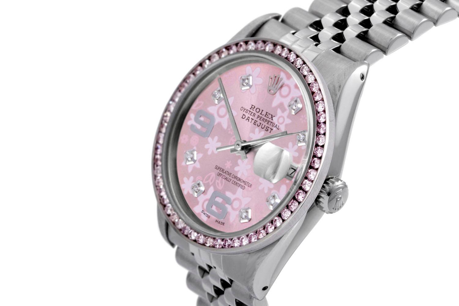 Brand - Rolex
Style - Datejust 
Gender - Unisex
Model - 16014
Case Size - 36mm
Metals - Stainless steel
Crystal - Sapphire
Dial - Custom Pink Floral 6&9 Diamond
Bezel - Steel 1.0CT Rose Stone
Movement - Rolex Cal-3035
Band - Rolex Steel Jubilee
