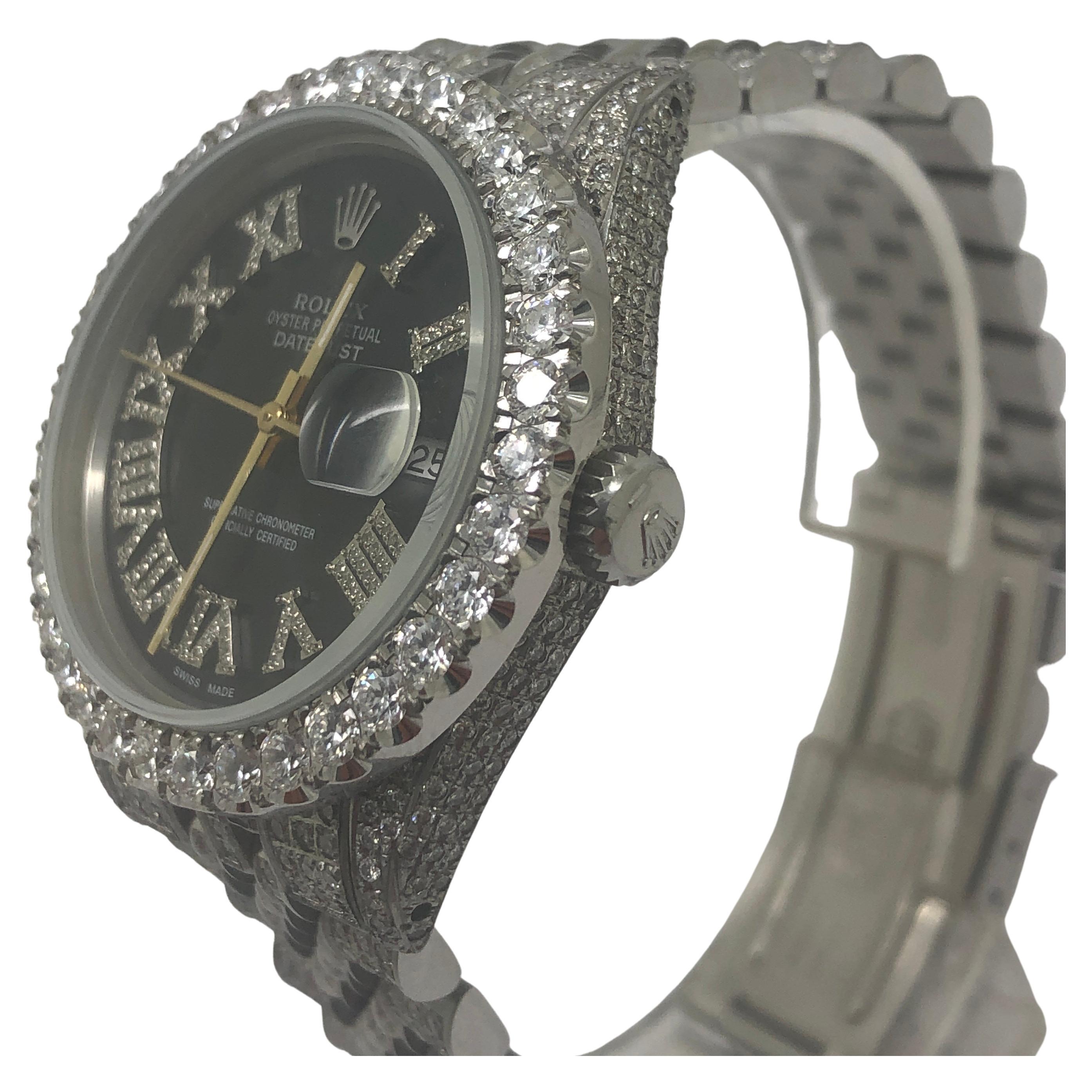 100% Authentic Rolex Datejust Iced out completely with collection quality vs white natural diamonds

8 carats in collection quality diamonds   Bezel has 10 pointers  F VVS quality 100% Natural
watch's customization means it cannot be serviced nor