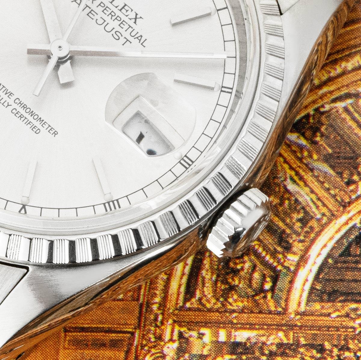 A 36mm Datejust in stainless steel by Rolex. Features a silver dial complemented by a fixed stainless steel fluted bezel. Featuring a Jubilee bracelet that comes with an Oyster folding clasp. Fitted with sapphire crystal and a self-winding automatic