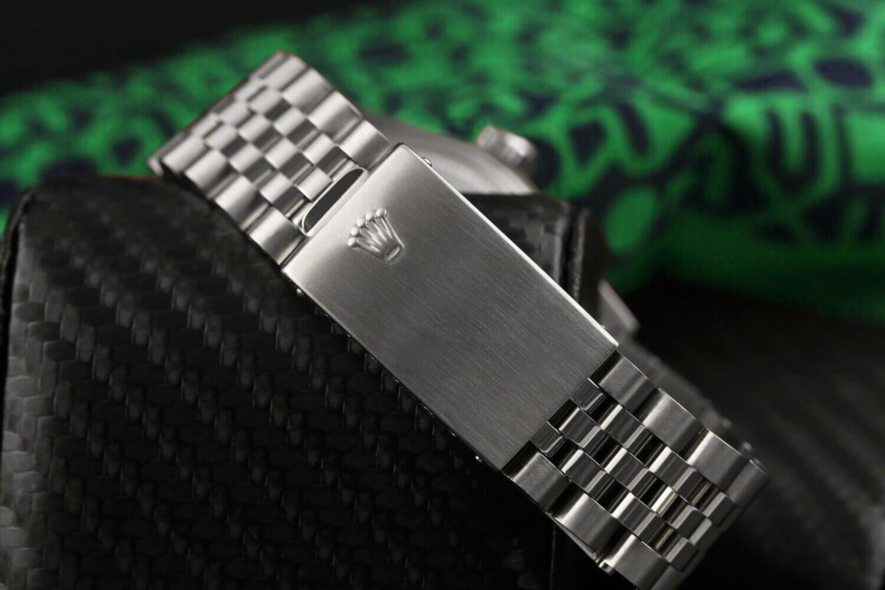 Rolex Datejust 36mm Stainless Steel Black Roman Dial with Diamond & Emerald Bezel 16030