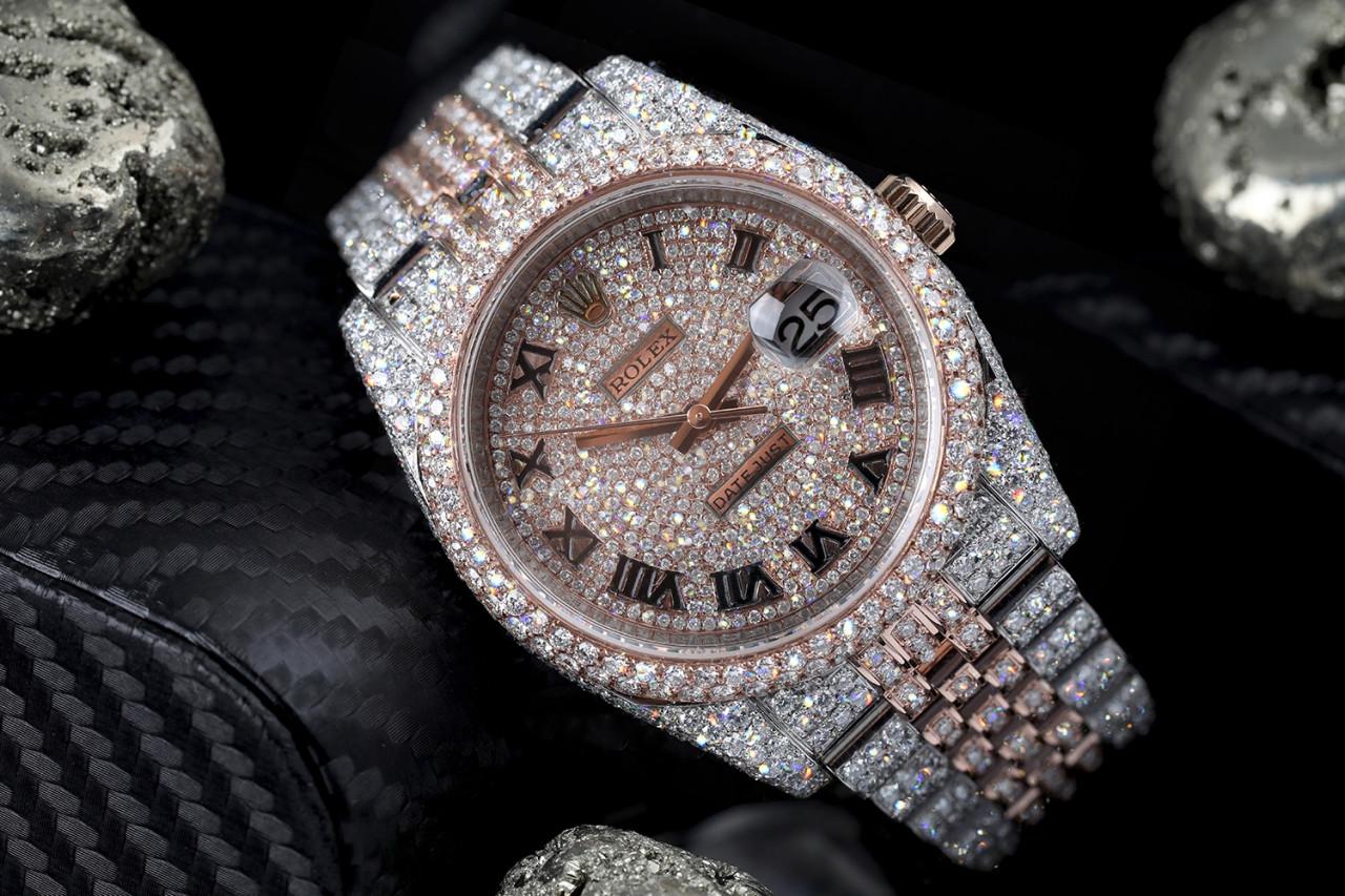 Rolex Datejust 36mm Steel and Pink Gold Custom Diamond Watch 116231 Custom Pave Diamond Dial.

This watch comes with the LIFETIME diamond replacement warranty. We are so confident in our diamonds setters that if any of the individual diamonds are