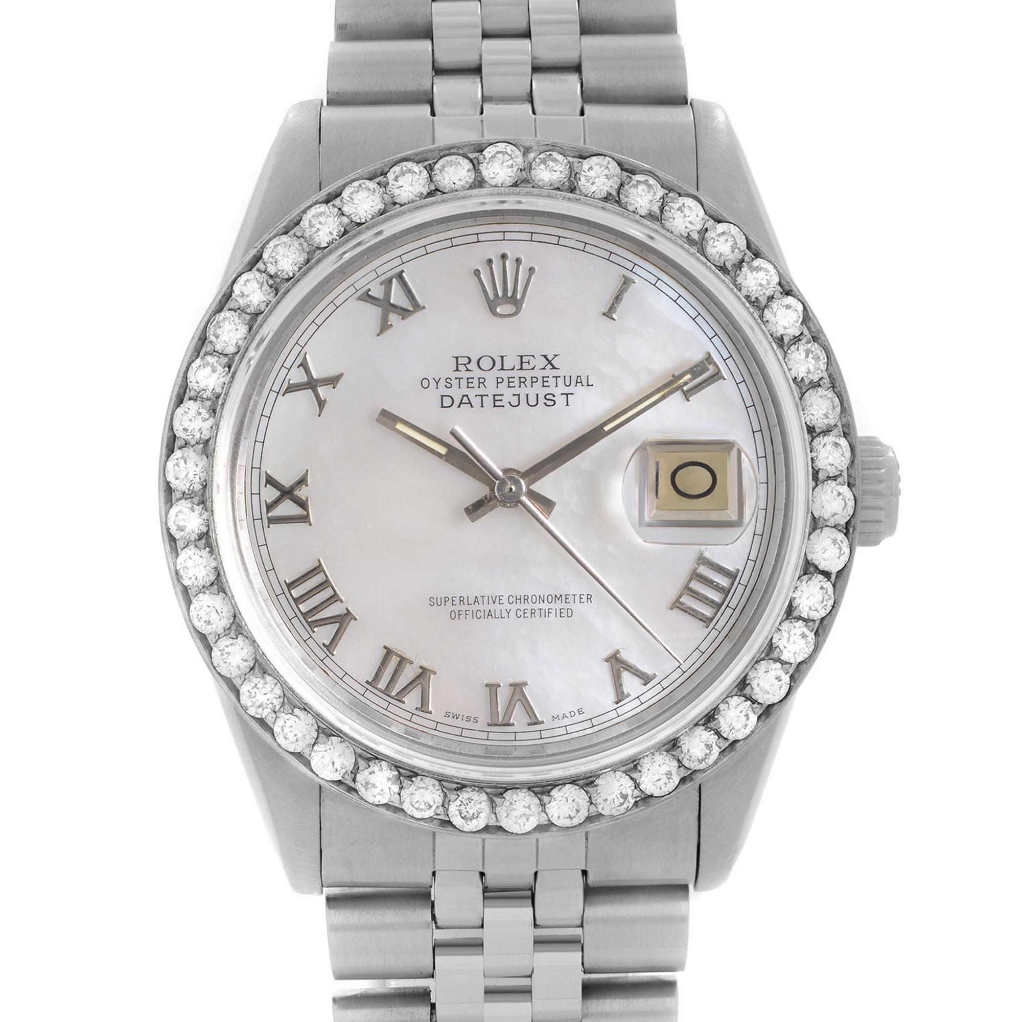 Pre-owned Vintage Rolex Datejust 36mm Steel Custom Diamond Bezel and MOP Dial Men's Watch 16030. Approx 2 carat Custom Diamond Bezel. Bracelet Show Moderate Slack Due to the Age of the Watch. This Beautiful Timepiece was Produced in 1979 and is