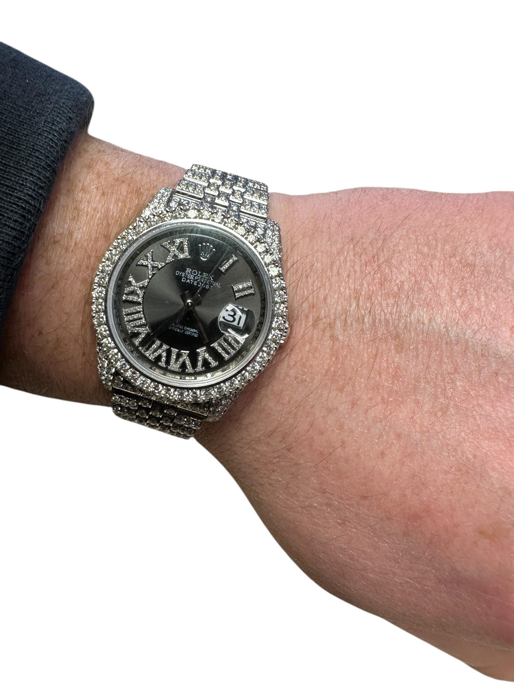Rolex Datejust Steel Roman Dial Iced Out Diamond Jubilee Band Watch 116200, This watch features approximately 15.00ct of aftermarket custom set round brilliant diamonds F Color and VS clarity. The dial and bezel are aftermarket. Includes box.