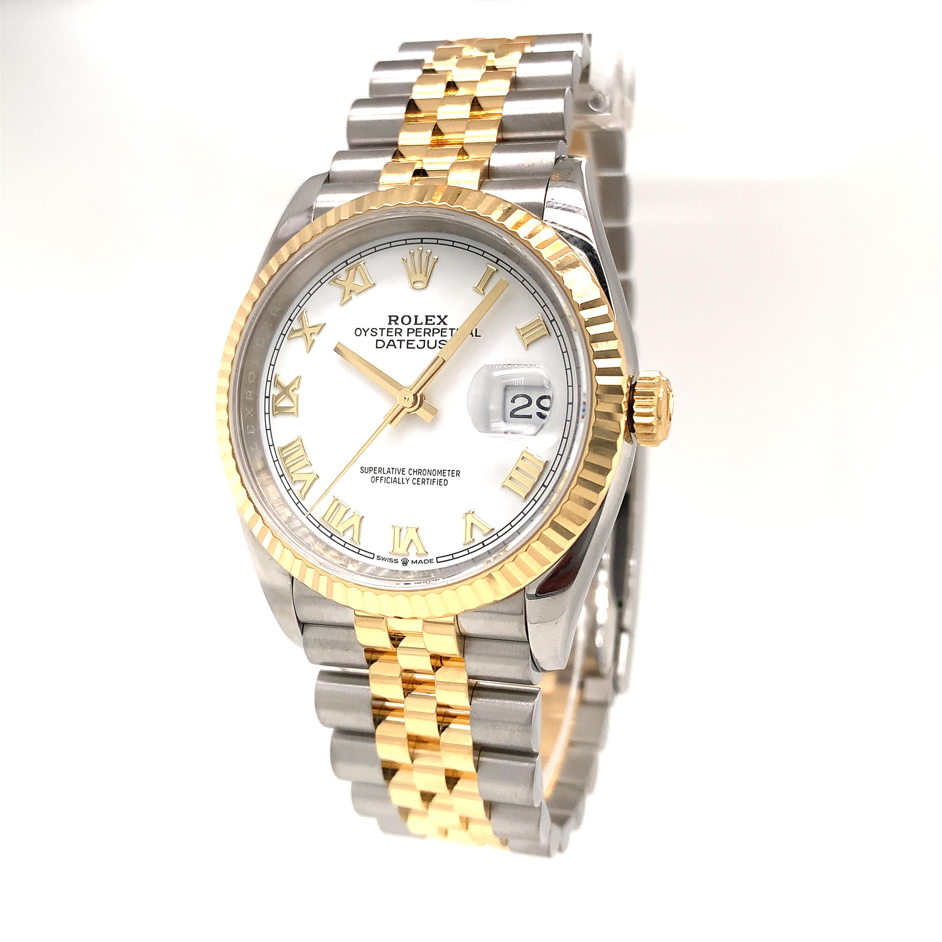 This Oyster Perpetual Datejust 36 in Oystersteel and Yellow gold features a white-color dial with roman numerals and a Jubilee bracelet. The light reflections on the case sides and lugs highlight the elegant profile of the 36 mm Oyster case, which