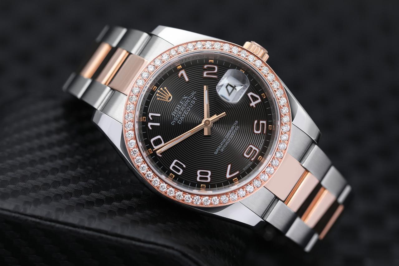 Rolex Datejust 36mm Two Tone Rose Watch Oyster Band Custom Diamond Bezel Black Dial Watch 116231

This watch is in like new condition. It has been polished, serviced and has no visible scratches or blemishes. All our watches come with a standard 1