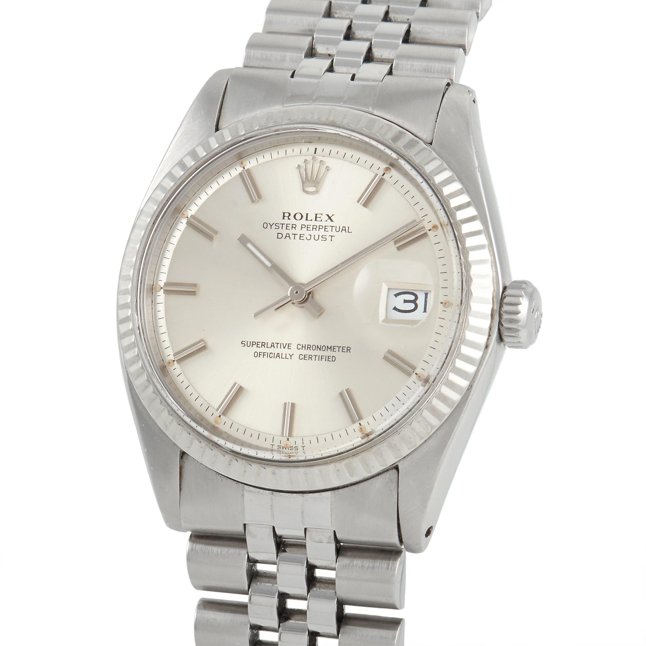 The Rolex Datejust Watch, reference number 1601, is sleek and sophisticated. 

This minimalist design begins with a 36mm case made from stylish 18K White Gold, which beautifully complements the Stainless Steel bracelet with clasp closure. A fluted