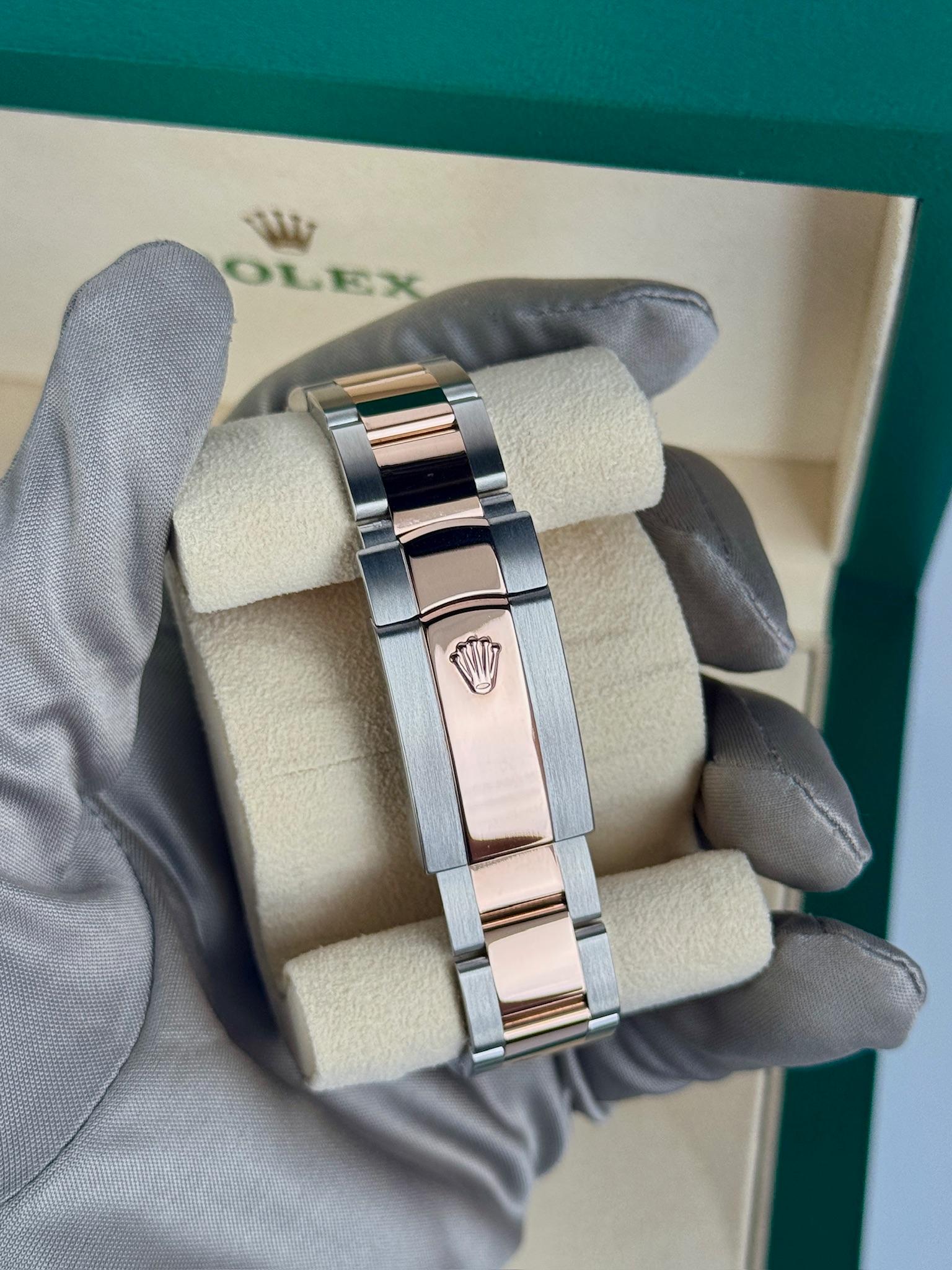 Rolex Datejust 36mm White Roman Dial Fluted RG/SS Oyster Date:2018 Style:126231 In Excellent Condition In Beverly Hills, CA