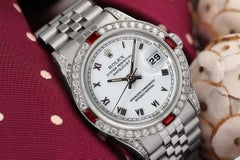 Rolex Datejust White Roman Dial Ruby/Diamond Bezel Jubilee Band Watch