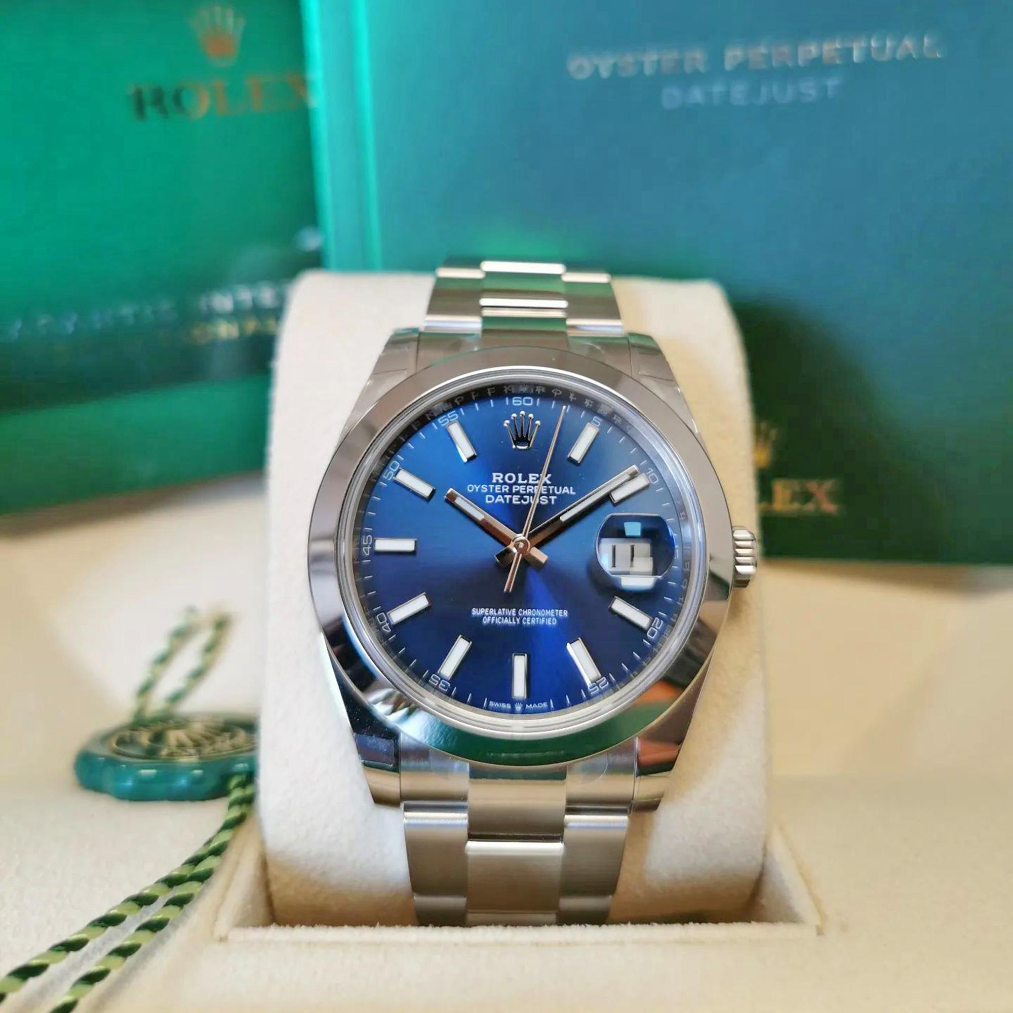 Rolex Datejust 41 watch with polished Stainless Steel case, Reference 126301-0001. This model has Bright blue dial with a fine sunray and highly legible Chromalight display with long-lasting blue luminescence. The dial is adorned with polished hands