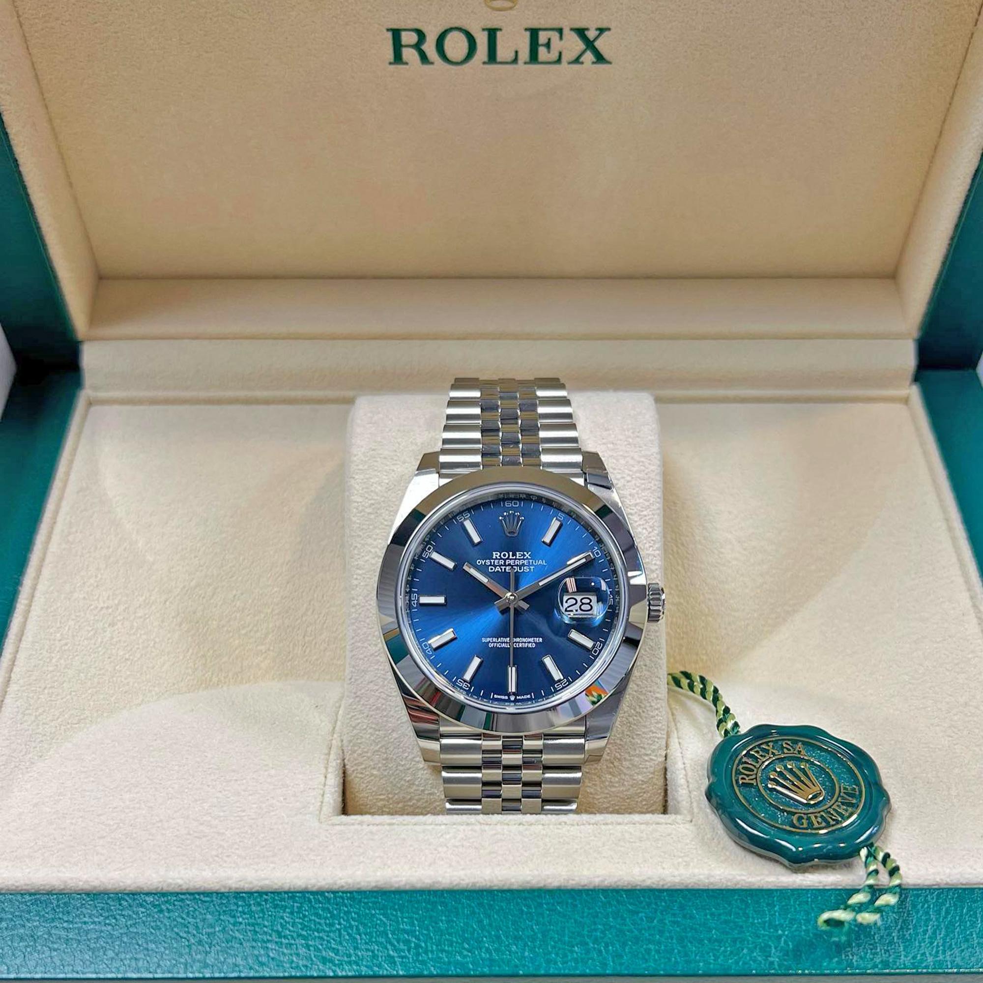 Rolex Datejust 41 watch with polished Stainless Steel case, Reference 126300-0002. This model has Bright blue dial with a fine sunray and highly legible Chromalight display with long-lasting blue luminescence. The dial is adorned with polished hands