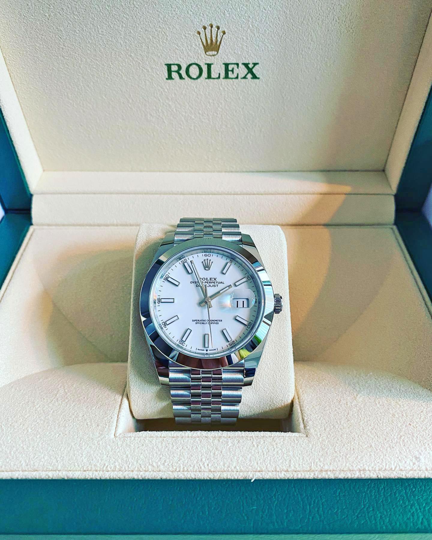 Rolex Datejust 41 watch with polished Stainless Steel case, Reference 126300-0006. This model has White dial with highly legible Chromalight display with long-lasting blue luminescence. The dial is adorned with polished hands - hour and minute hands