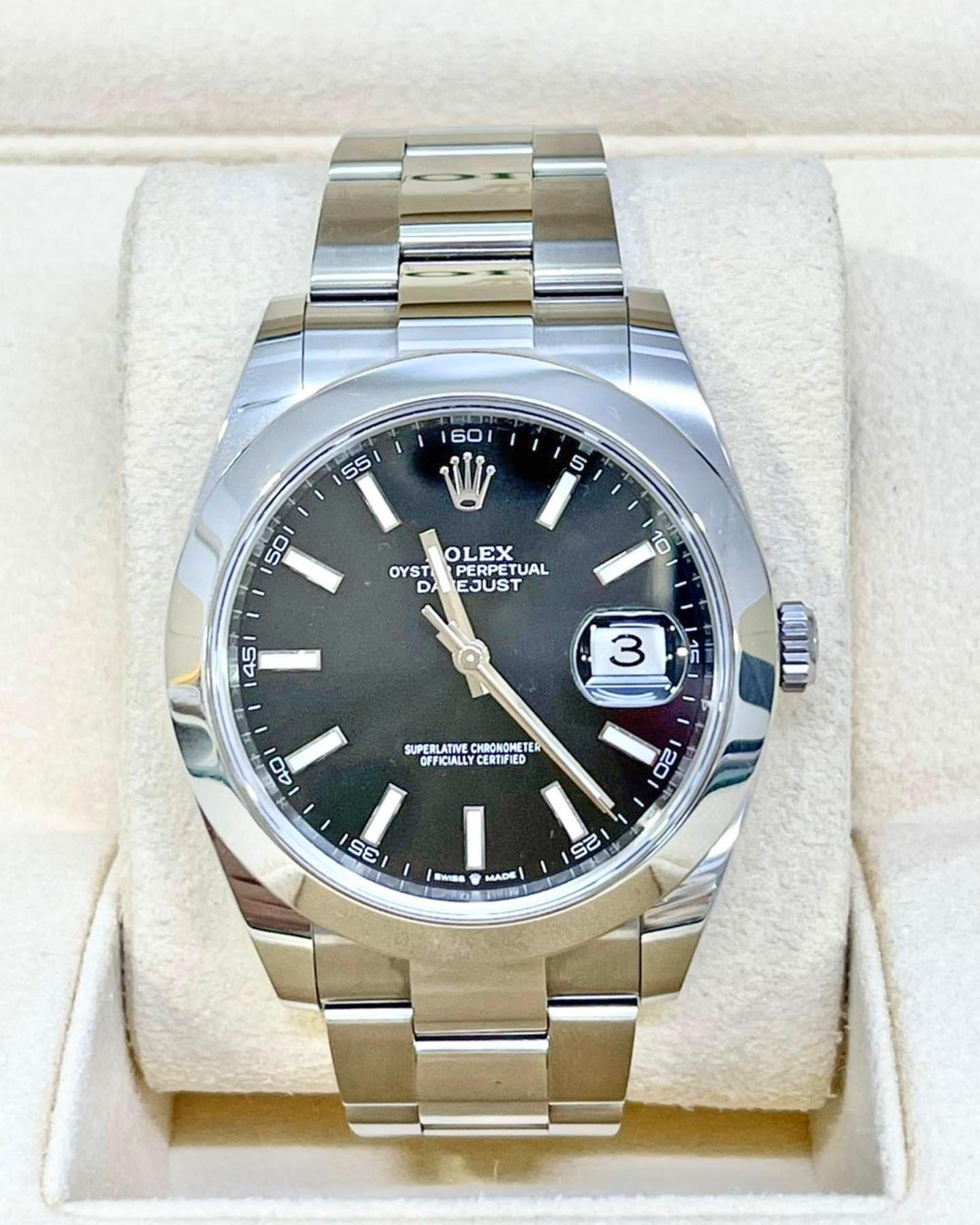Rolex Datejust 41 watch with polished Stainless Steel case, Reference 126300-0011. This model has Bright black dial with a fine sunray and highly legible Chromalight display with long-lasting blue luminescence. The dial is adorned with polished