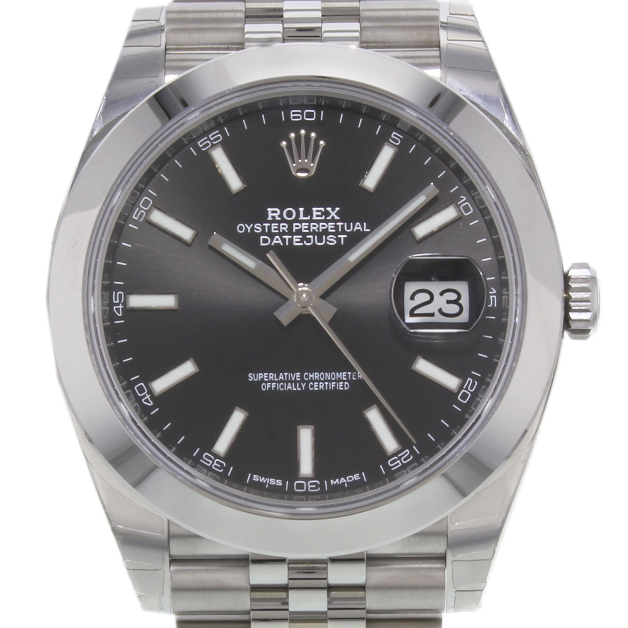 (19559)
This brand new Rolex Datejust 41 126300 bkij is a beautiful men's timepiece that is powered by an automatic movement which is cased in a stainless steel case. It has a round shape face, date dial and has hand sticks style markers. It is