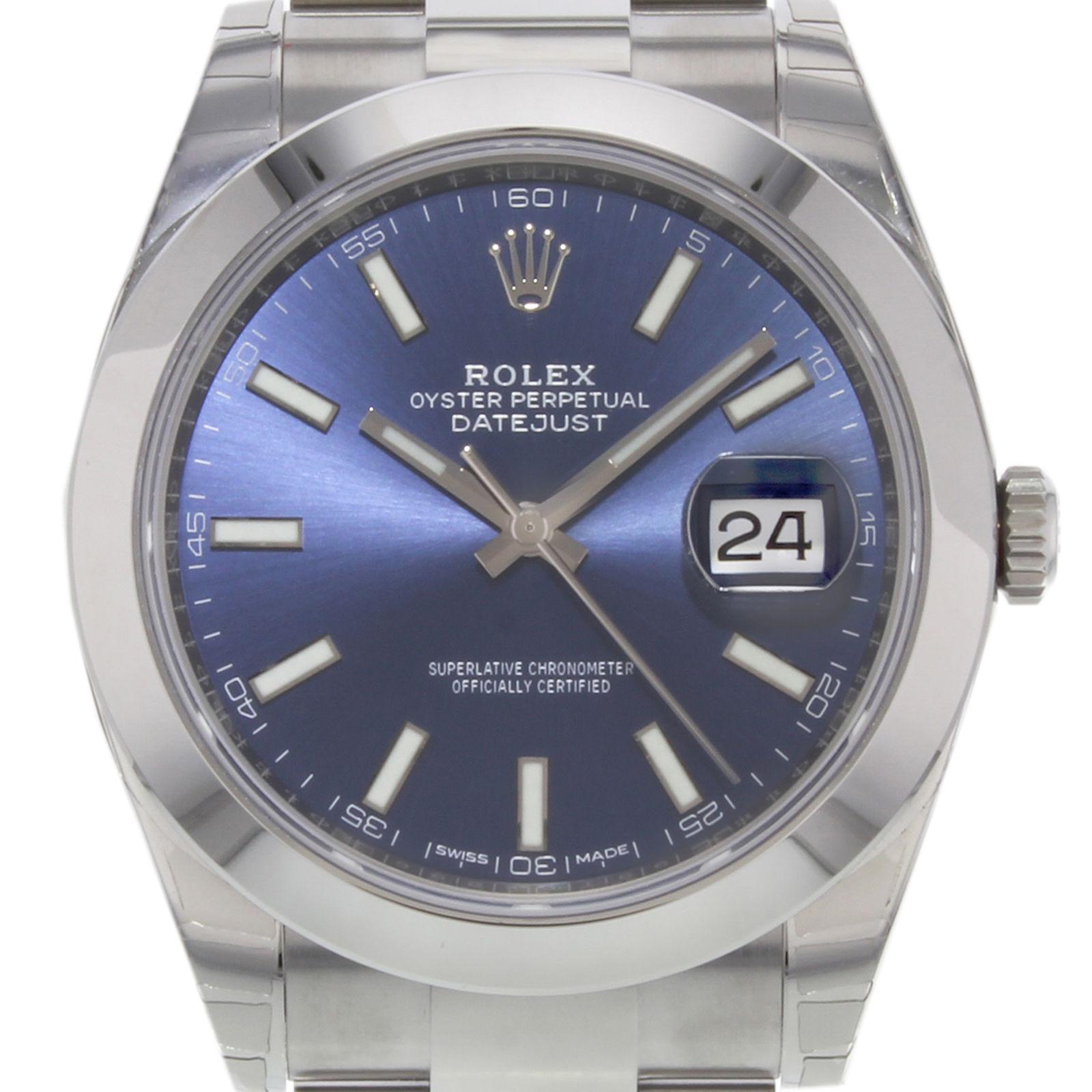 (19561)
This brand new Rolex Datejust 41 126300 blio is a beautiful men's timepiece that is powered by an automatic movement which is cased in a stainless steel case. It has a round shape face, date dial and has hand sticks style markers. It is