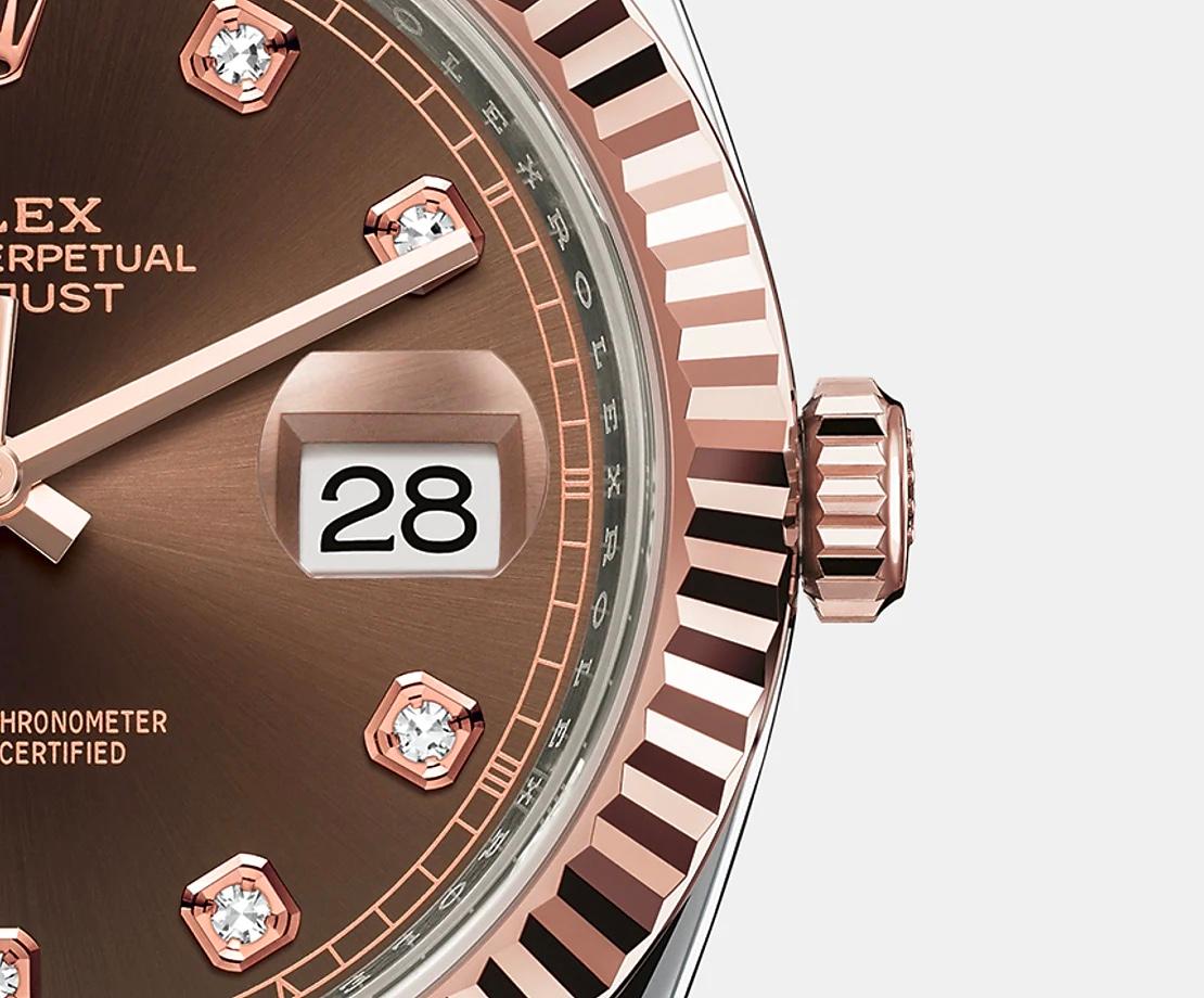Rolex Datejust 41 watch with polished 18k Everose Gold and Stainless Steel case, Reference 126331-0004. This model has Chocolate dial with a fine sunray. The dial is adorned with polished 18k Everose Gold hands and Hour markers are 10 Diamonds in