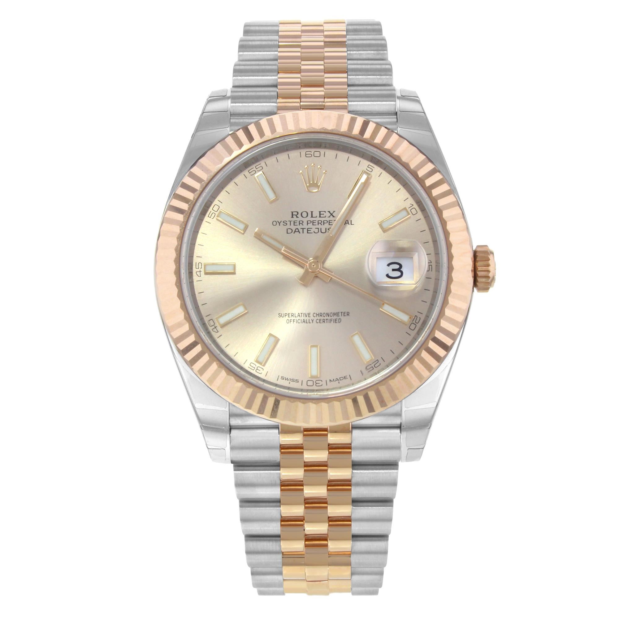 This brand new Rolex Datejust 41 126331  is a beautiful men's timepiece that is powered by an automatic movement which is cased in a stainless steel case. It has a round shape face, date dial, and has hand sticks style markers. It is completed with