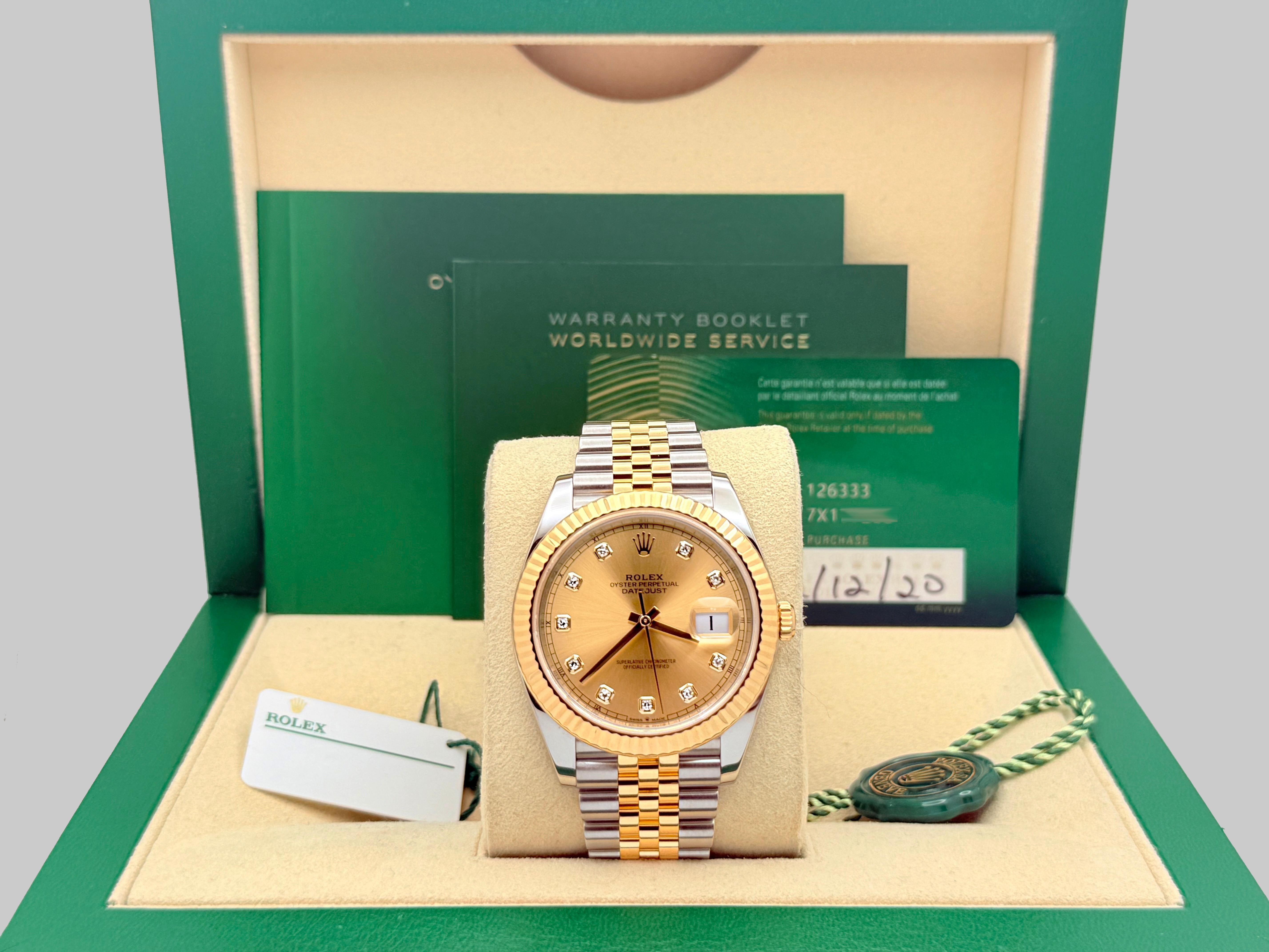 Style Number: 126333

Serial: 7X1****

Year: 2020

Model: Rolex Datejust 41

Case Material: Stainless Steel

Band: 18k Yellow Gold & Stainless Steel Jubilee

Bezel: 18k Yellow Gold Fluted Bezel

Dial: Factory Champagne Diamond Dial 

Crystal: