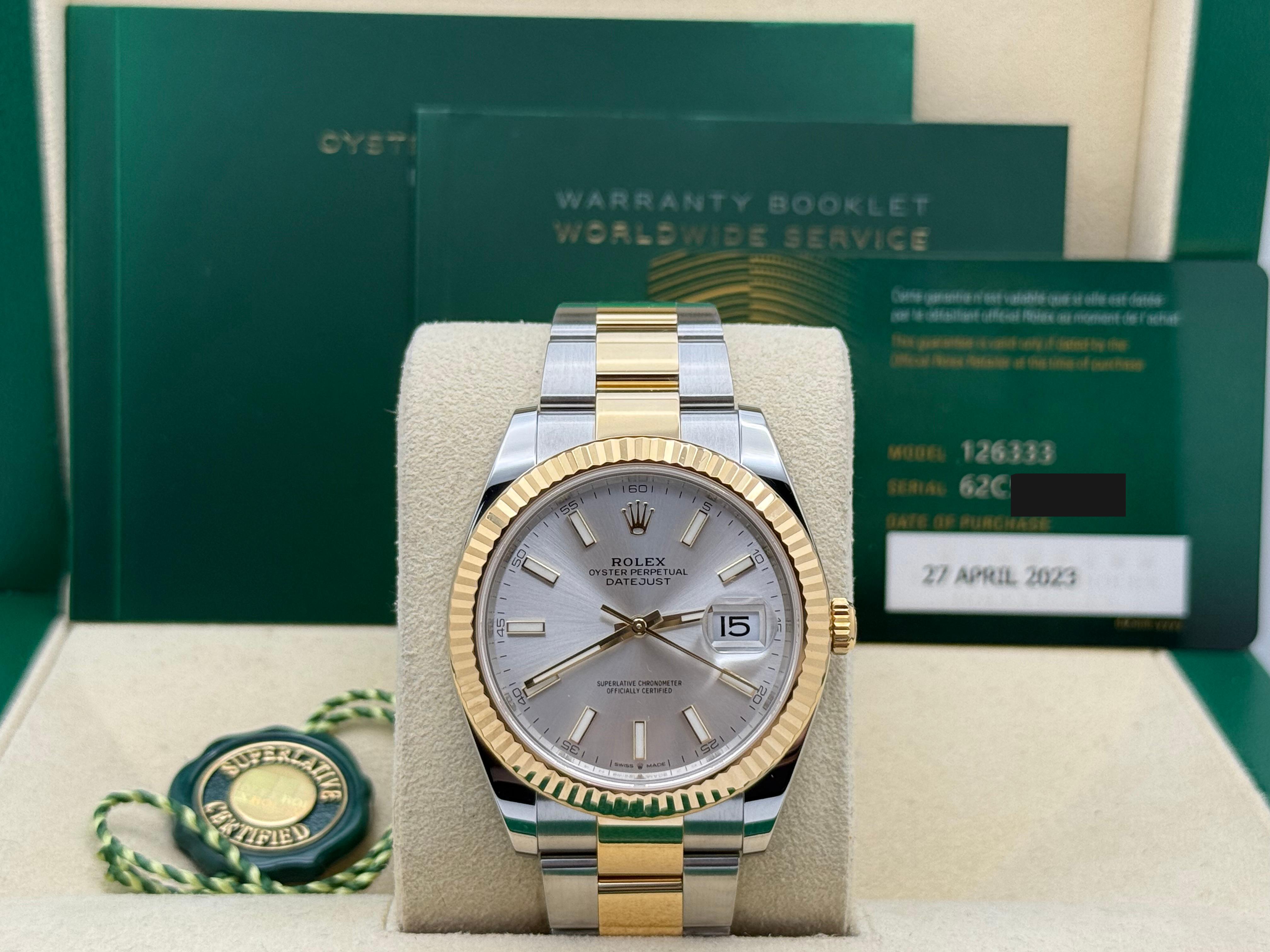 Style Number: 126333

Serial: 62C*****

Year: 2023

Model: Rolex Datejust 41

Case Material: Stainless Steel 

Band: 18K Yellow Gold & Stainless Steel 

Bezel: 18K Yellow Gold 

Dial: Silver 

Face: Sapphire Crystal 

Case Size: 41mm 

Includes: