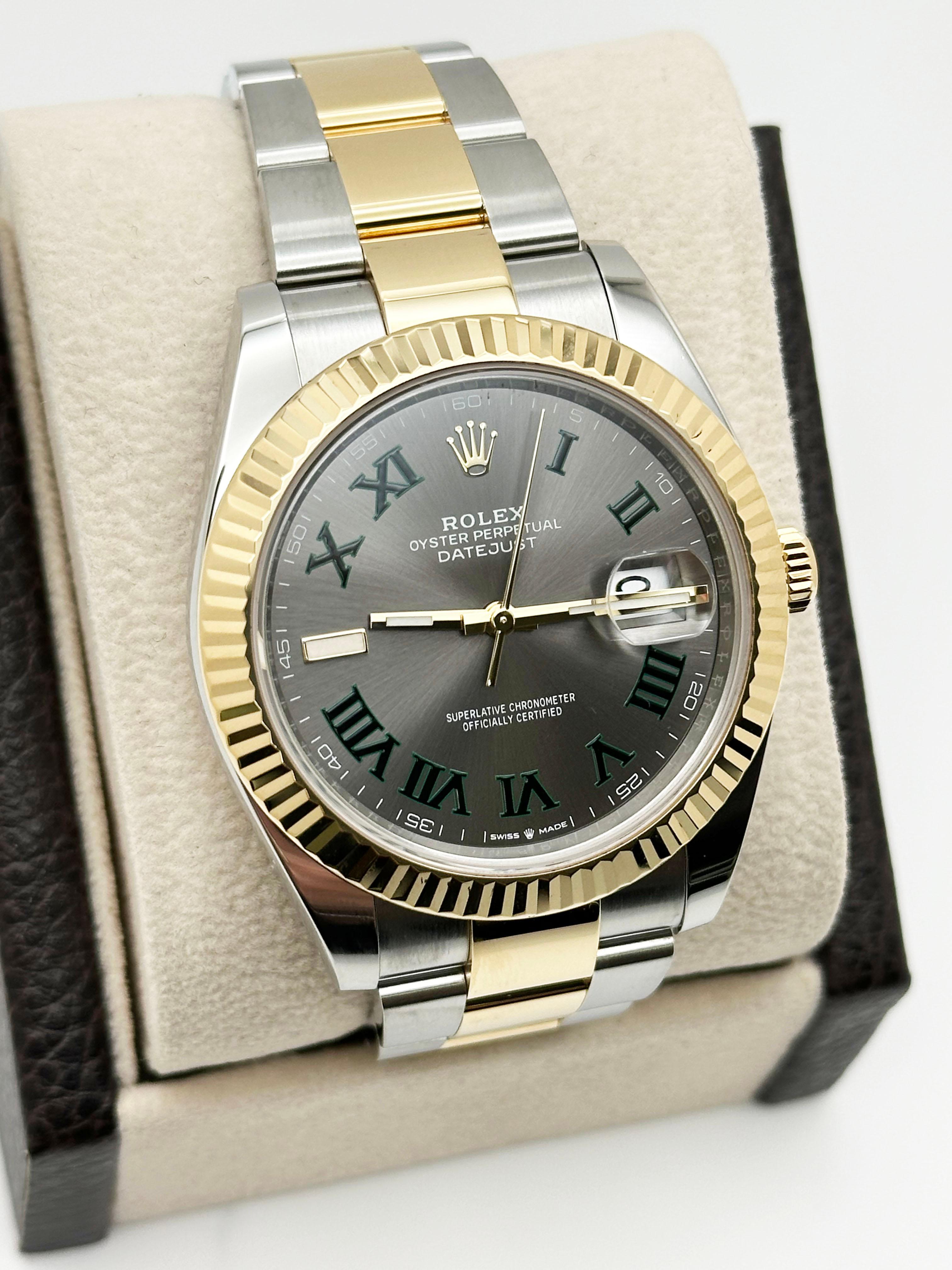 Style Number: 126333



Serial: 57VQ8***



Year: 2023

 

Model: Rolex Datejust 41

 

Case Material: Stainless Steel 

 

Band: 18K Yellow Gold & Stainless Steel 

  

Bezel: 18K Yellow Gold Fluted Bezel 

  

Dial: Wimbledon Dial 

 

Face: