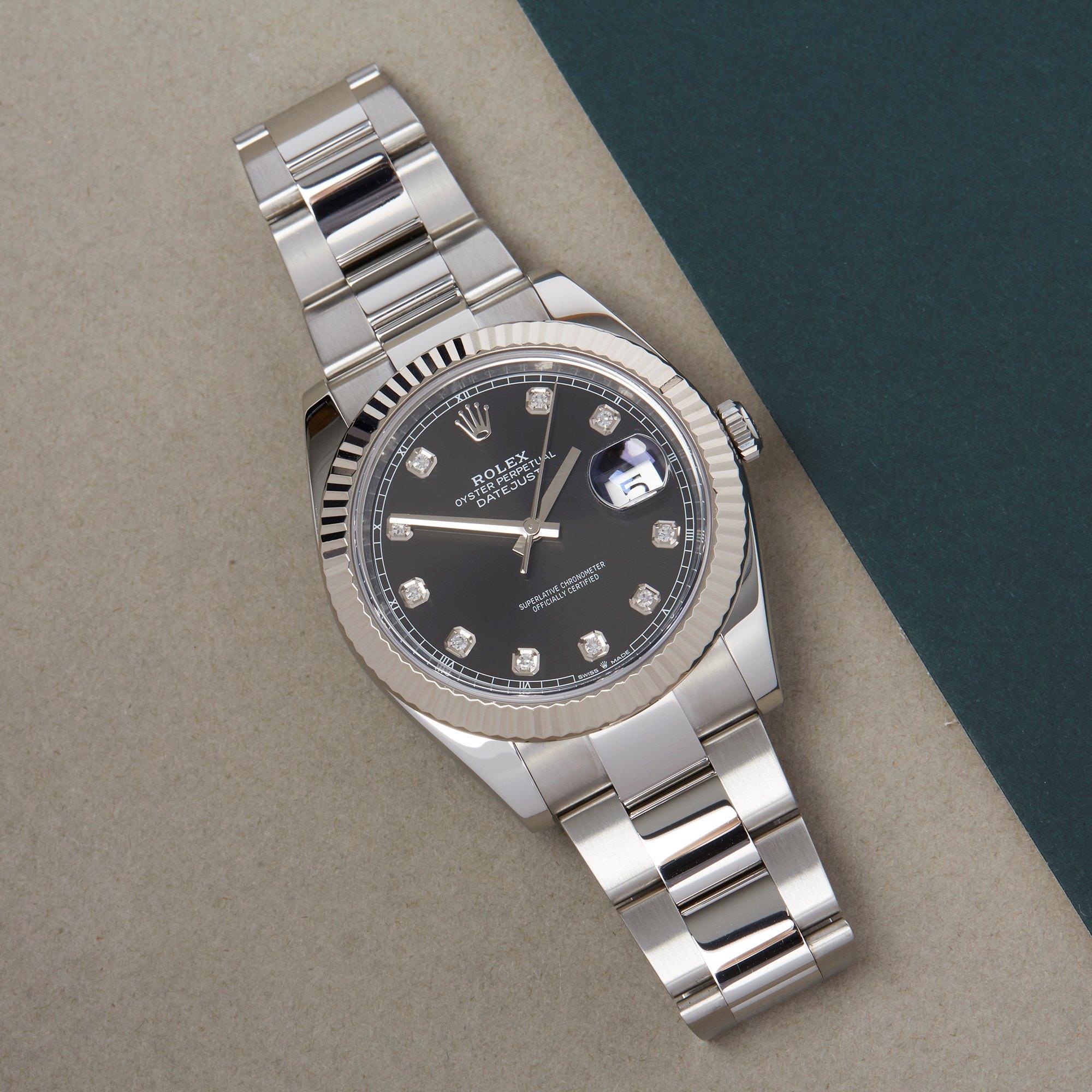 Xupes Reference: W007622
Manufacturer: Rolex
Model: Datejust
Model Variant: 41
Model Number: 126334
Age: 43743
Gender: Men
Complete With: Rolex Box, Manuals, Guarantee, Card Holder & Swing Tag
Dial: Black With Diamond Markers
Glass: Sapphire