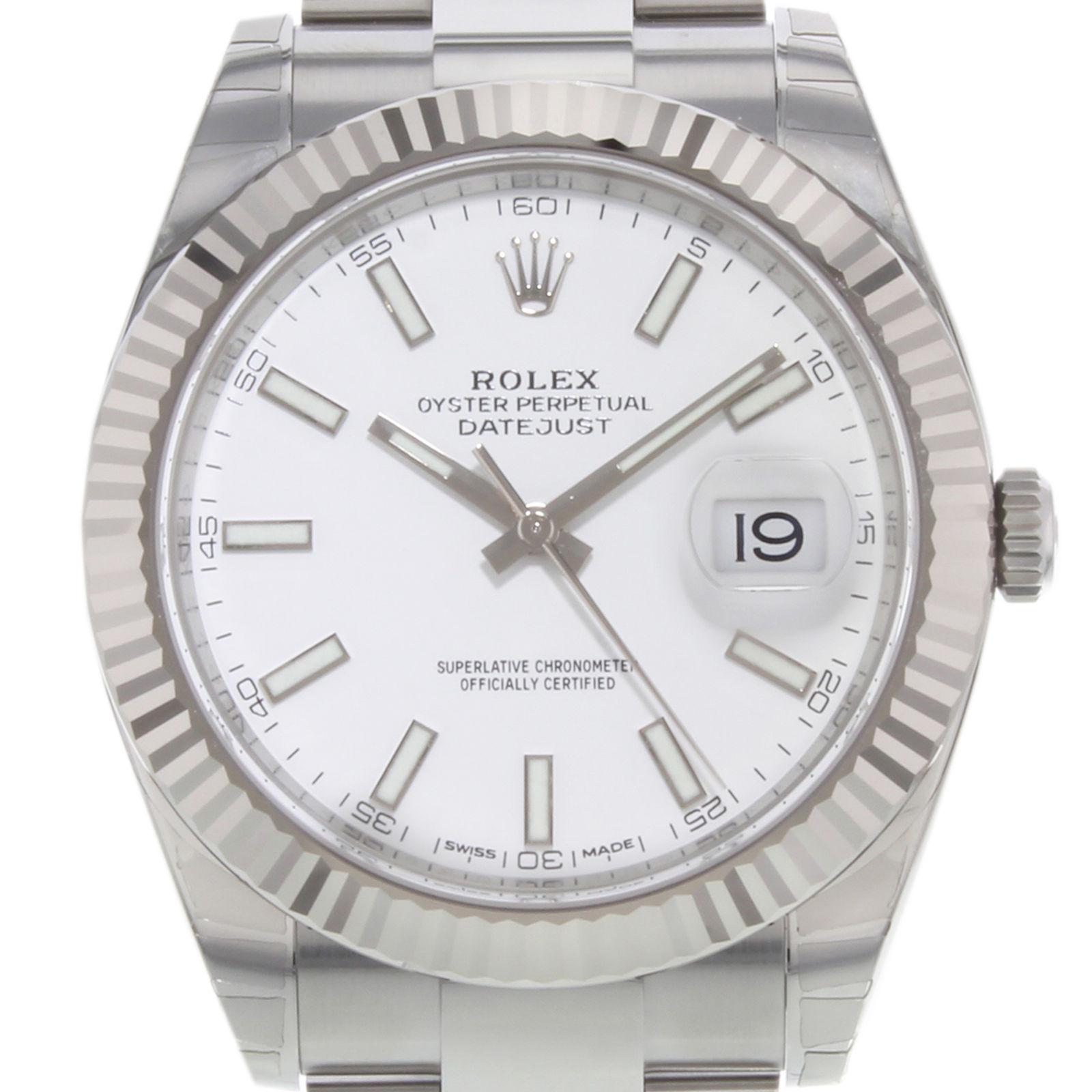 (19539)
This brand new Rolex Datejust 41 126334 wio is a beautiful men's timepiece that is powered by an automatic movement which is cased in a stainless steel case. It has a round shape face, date dial and has hand sticks style markers. It is