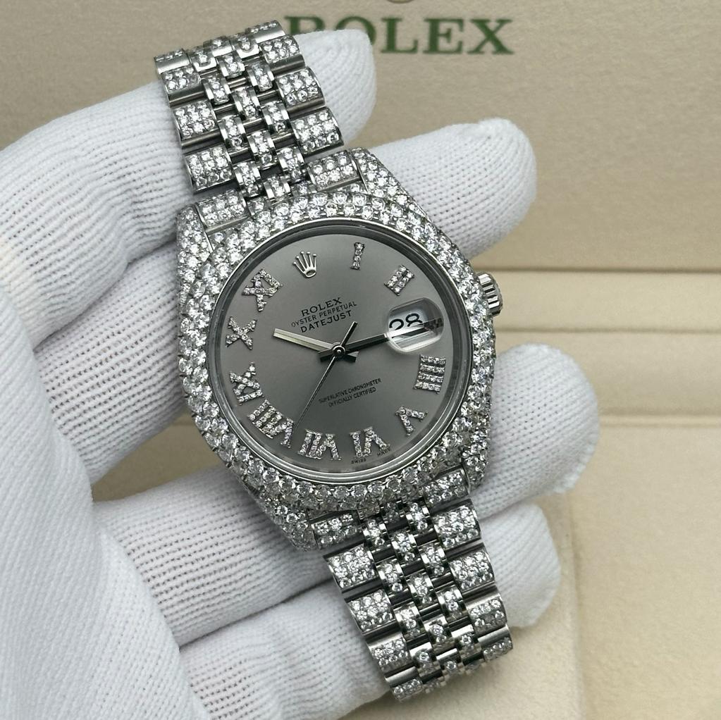 Custom diamonds totaling approximately 14.39cttw Color: G-H Clarity: VS-SI. Covered by a 3-year warranty. Comes with the original box and papers.


General Information
Brand: Rolex
Model Number: 126300
Model: Rolex Datejust 126300
Type: