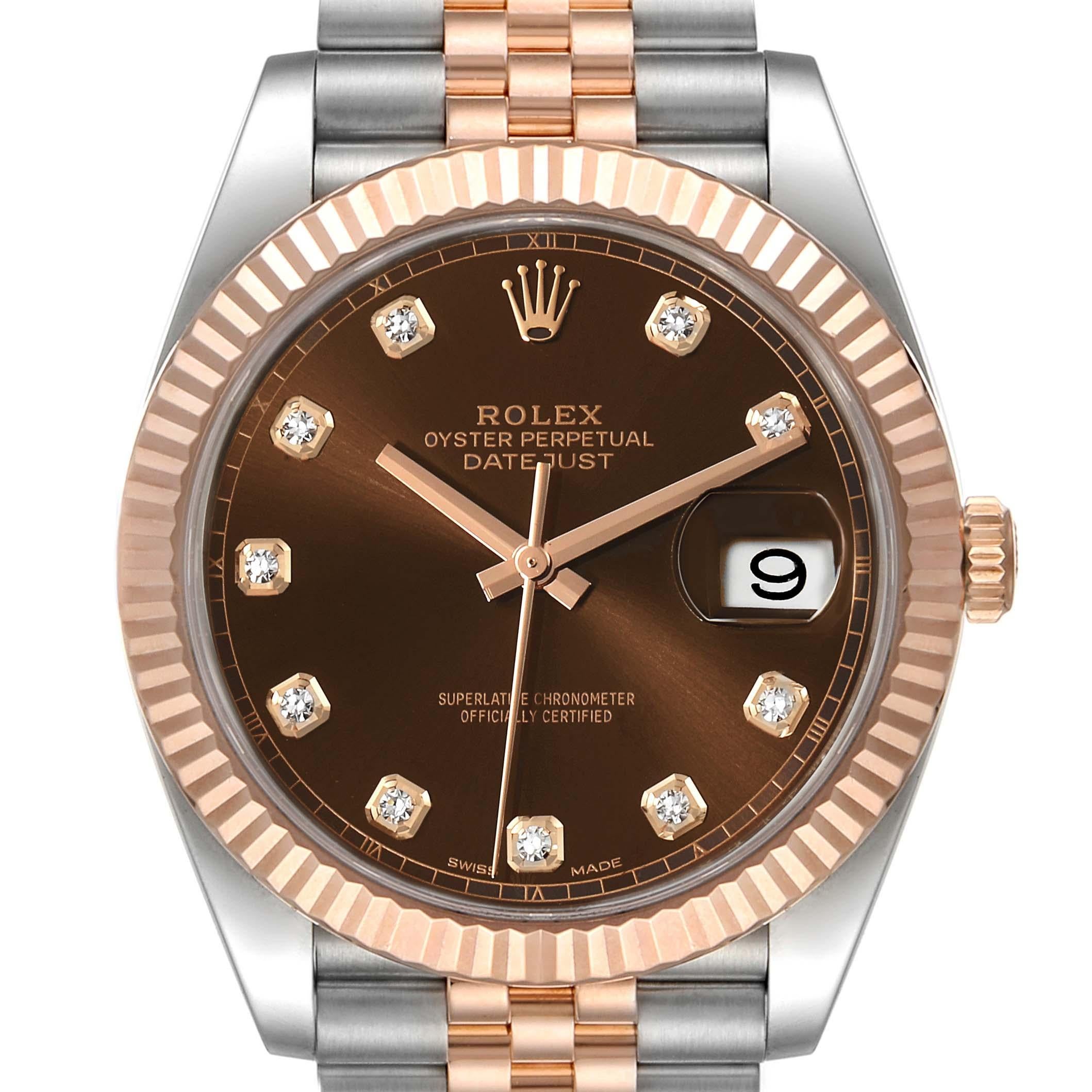 Stainless steel case with a stainless steel Rolex jubilee bracelet with 18kt everose gold center links. Fixed fluted 18kt everose gold bezel. Chocolate dial with rose gold hands and diamond / small Roman numeral hour markers. Minute markers around