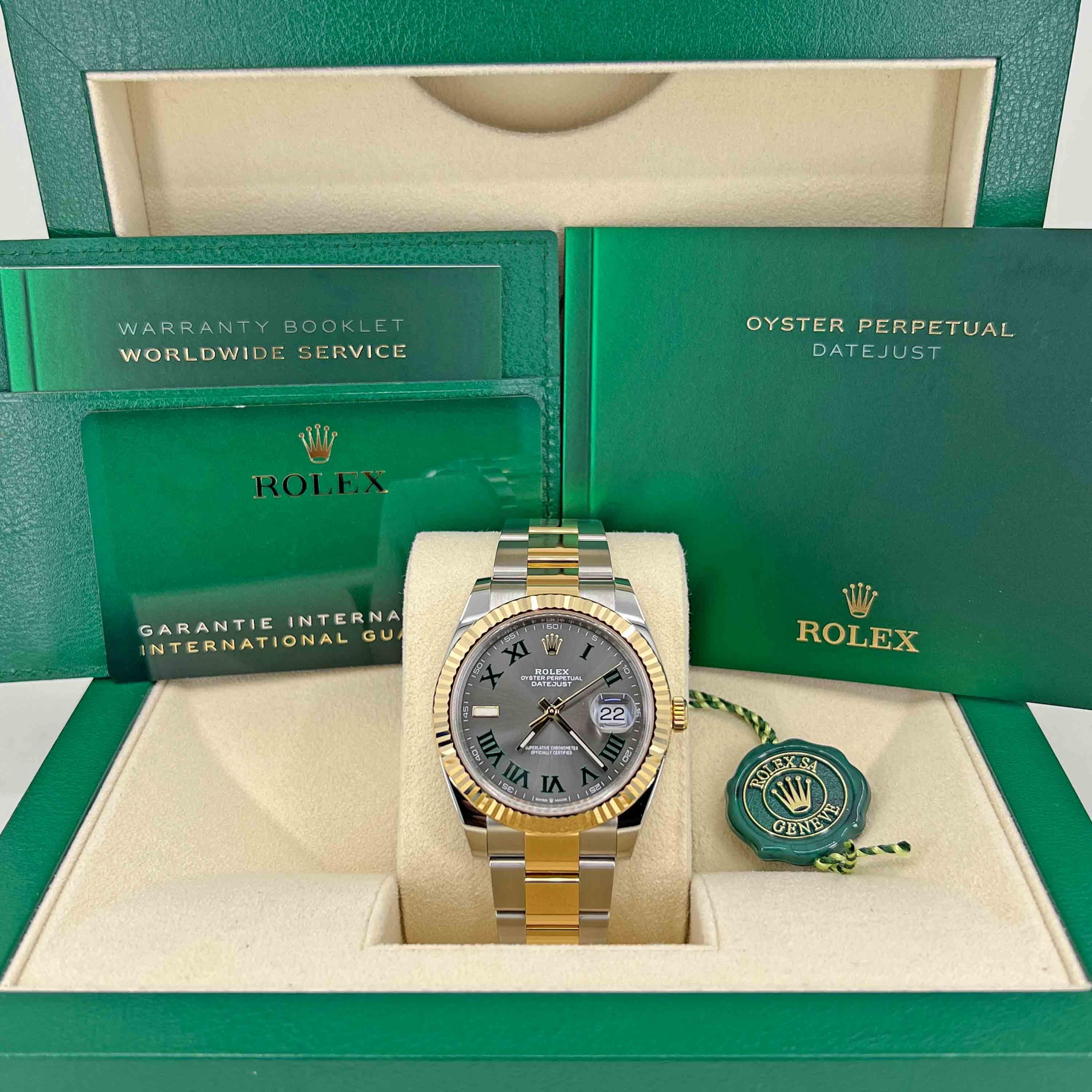 Rolex Steel and Yellow Gold Rolesor Datejust 41 Watch - Fluted Bezel - Slate Green Roman Dial - Oyster Bracelet

41 mm Yellow Rolesor case with 904L steel monobloc middle case, screw-down steel back, 18K yellow gold screw-down crown, 18K yellow gold