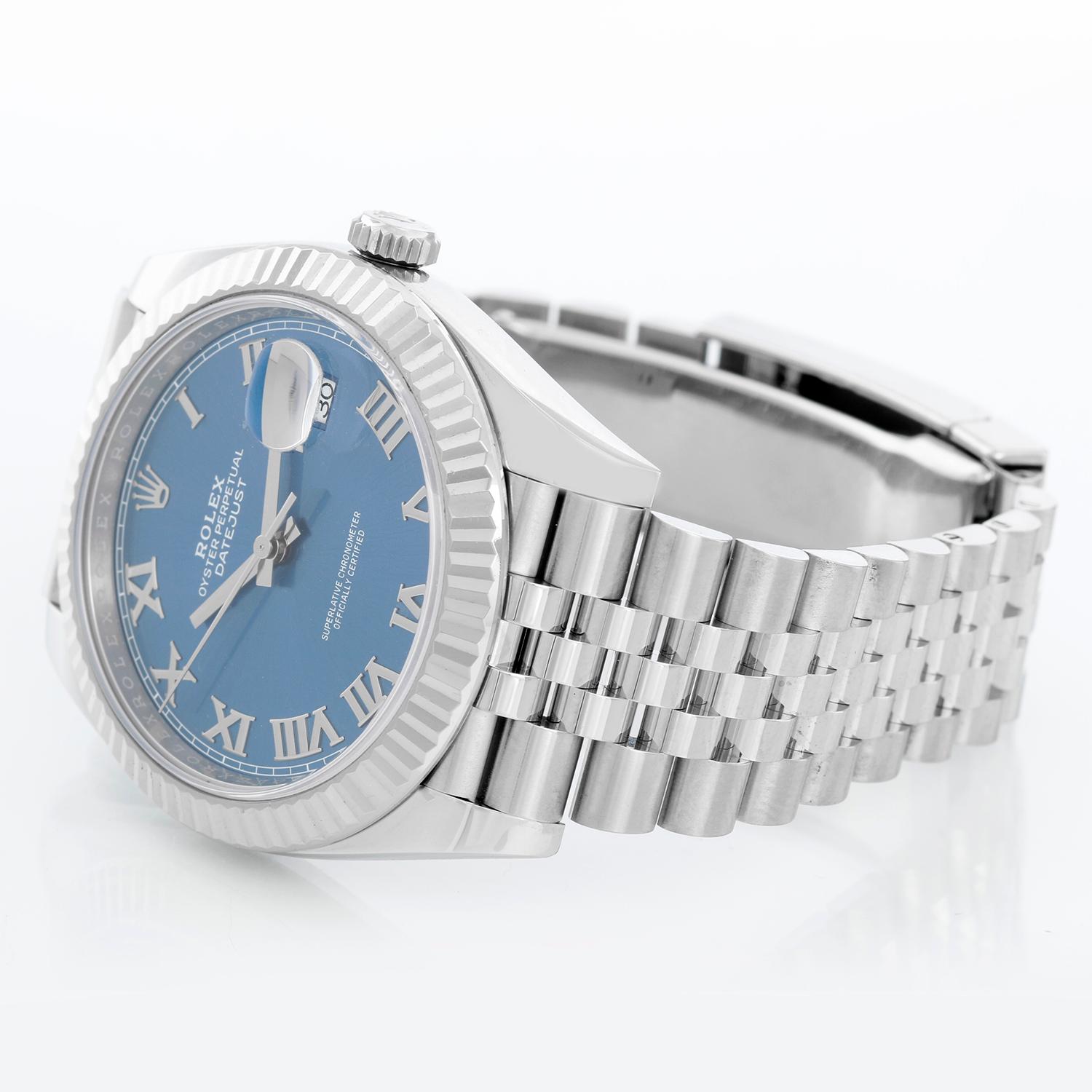 Rolex Datejust 41  Stainless Steel Men's Blue Roman Watch 126334 - Automatic winding, Quickset, sapphire crystal. Stainless steel case with 18k white gold fluted bezel  (41mm diameter). Blue Roman dial. Stainless steel oyster bracelet. Pre-owned