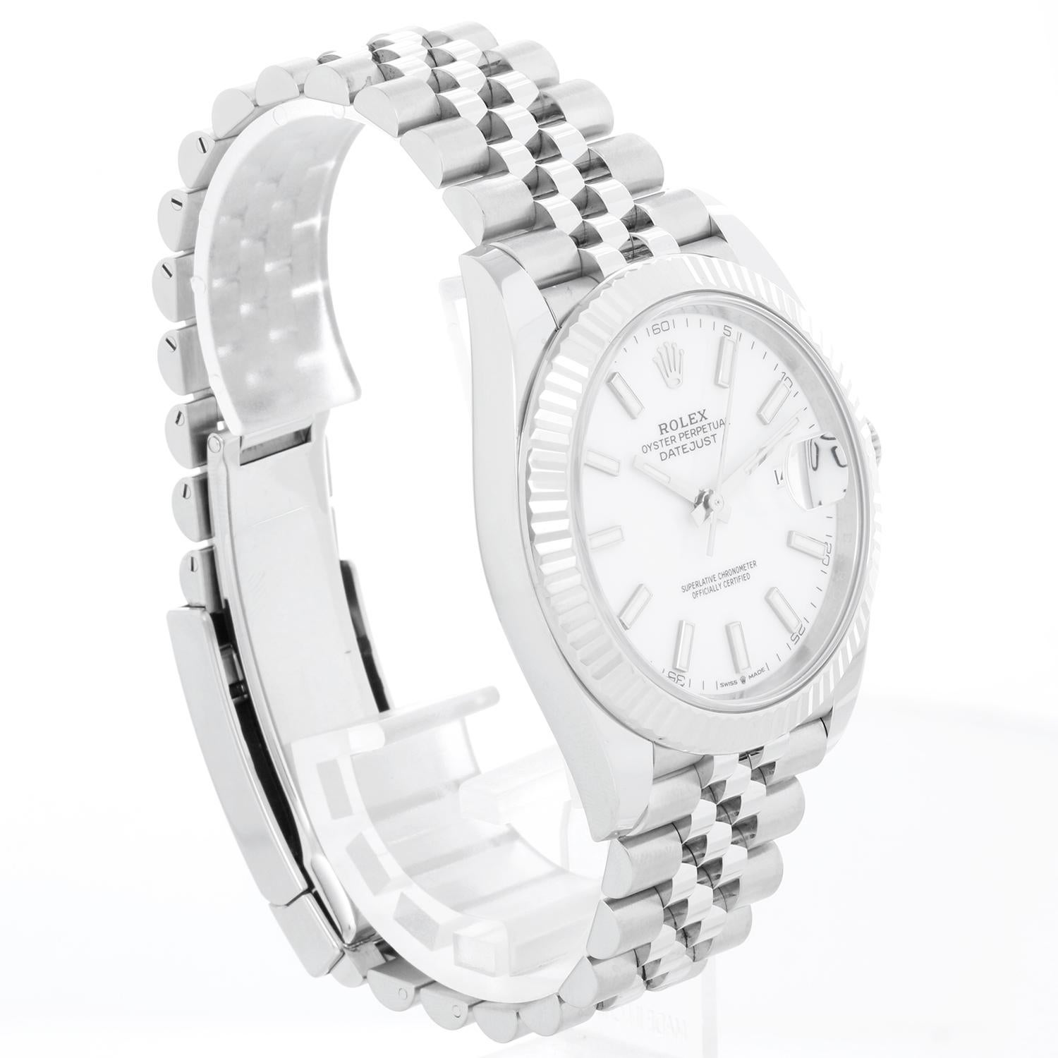 Rolex Datejust 41 Stainless Steel Men's White Dial Watch 126334 - Automatic winding, Quickset, sapphire crystal. Stainless steel case with 18k white gold fluted bezel  (41mm diameter). White dial with index markers. Stainless steel Jubilee bracelet.