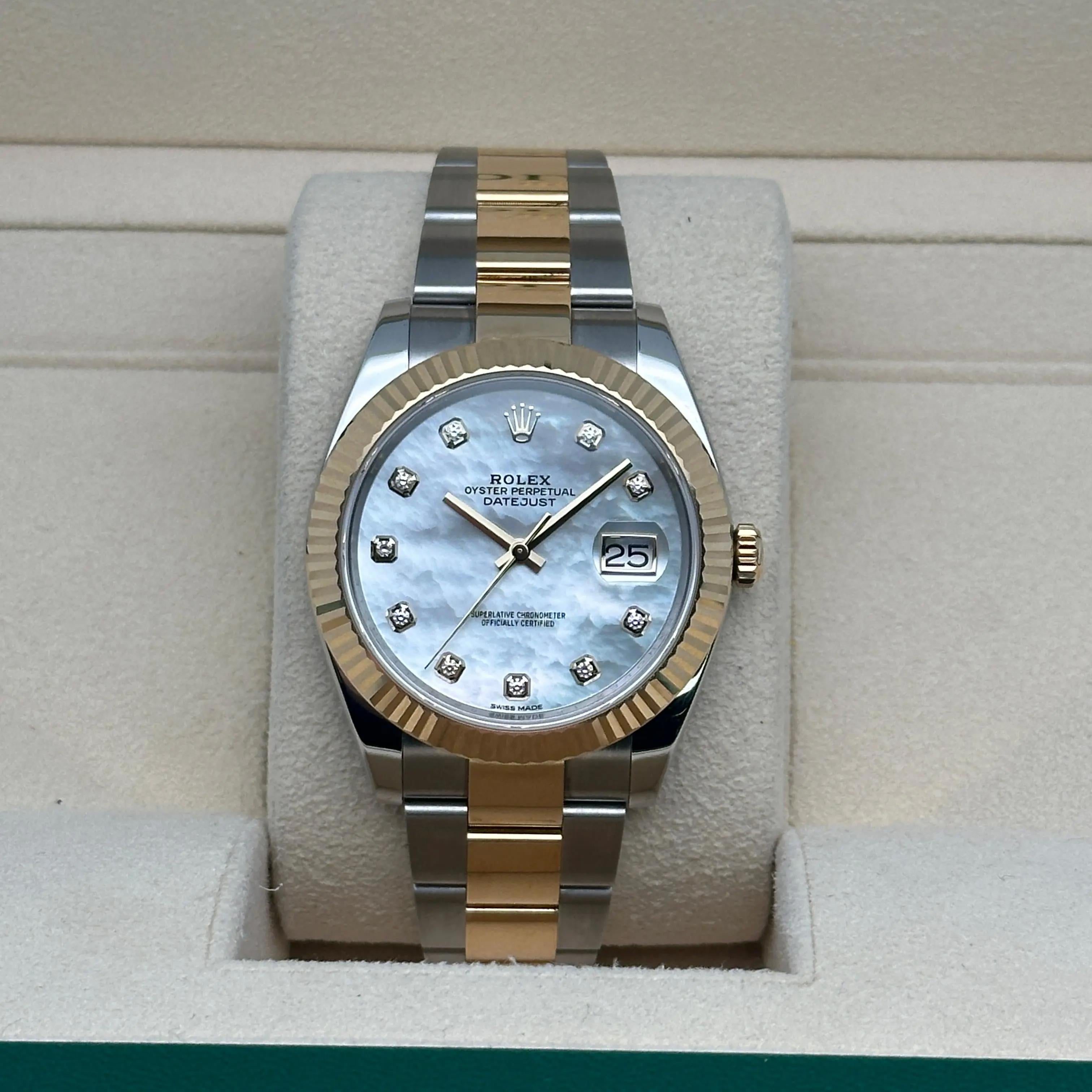Pre-owned in excellent condition. It comes with an original box, no papers.
