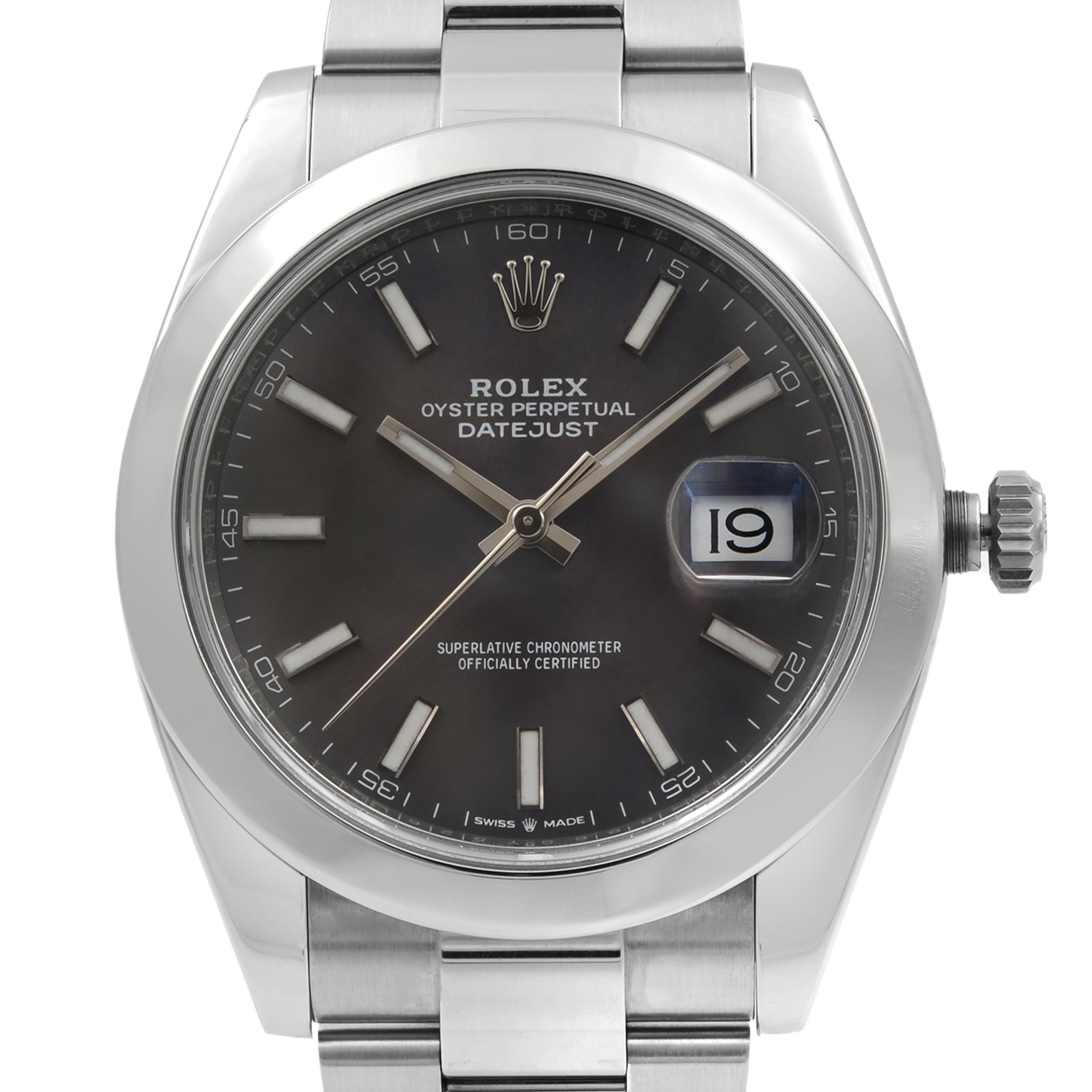 This pre-owned Rolex Datejust 41 126300 is a beautiful men's timepiece that is powered by mechanical (automatic) movement which is cased in a stainless steel case. It has a round shape face, date indicator dial and has hand sticks style markers. It