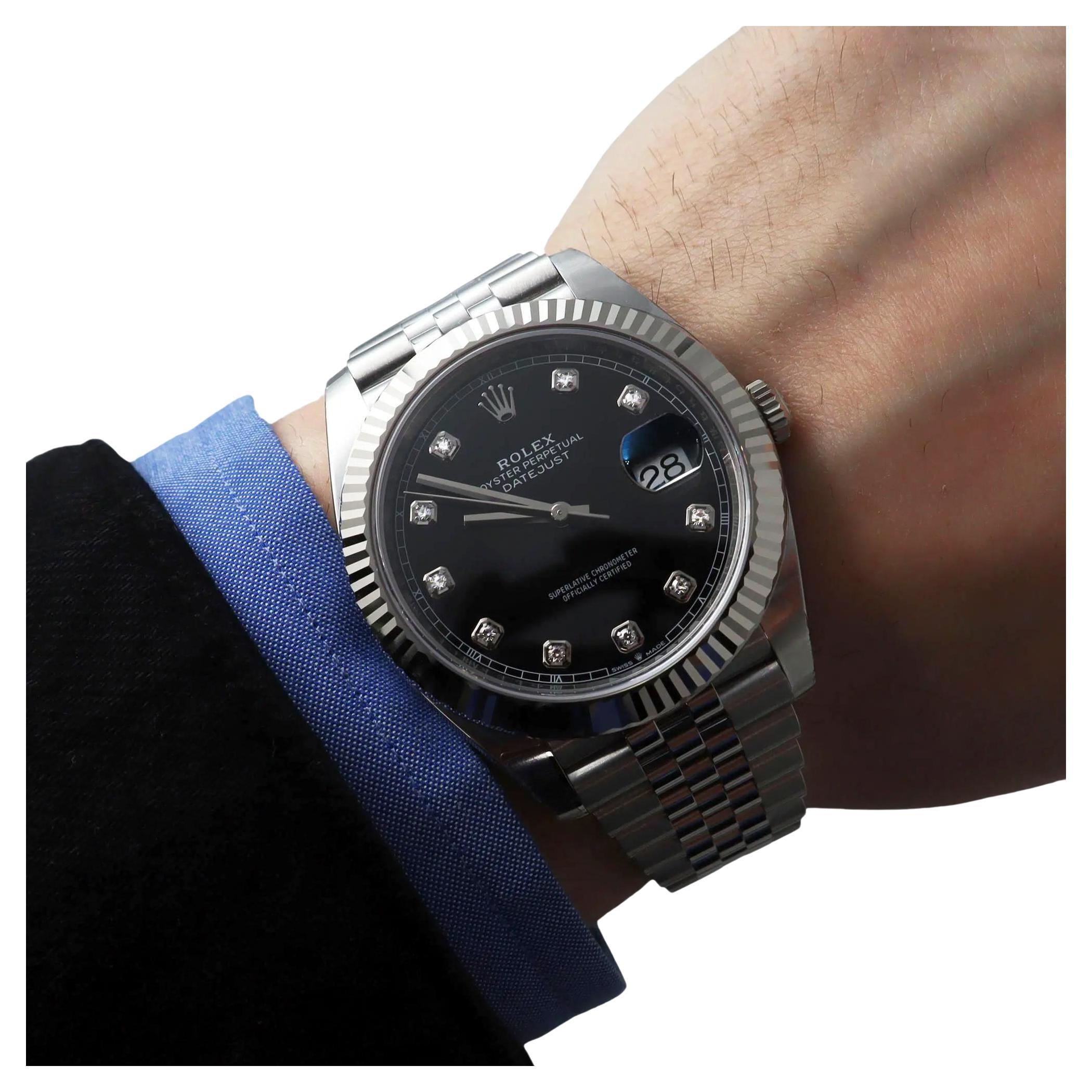 Unworn 2023 Card. Box and papers included. 5-year warranty. 

Brand and Model Information:
Brand: Rolex
Model: Rolex Datejust 126334
Type, Style, and Manufacturing:

Type: Wristwatch
Style: Luxury
Department: Men
Country/Region of Manufacture:
