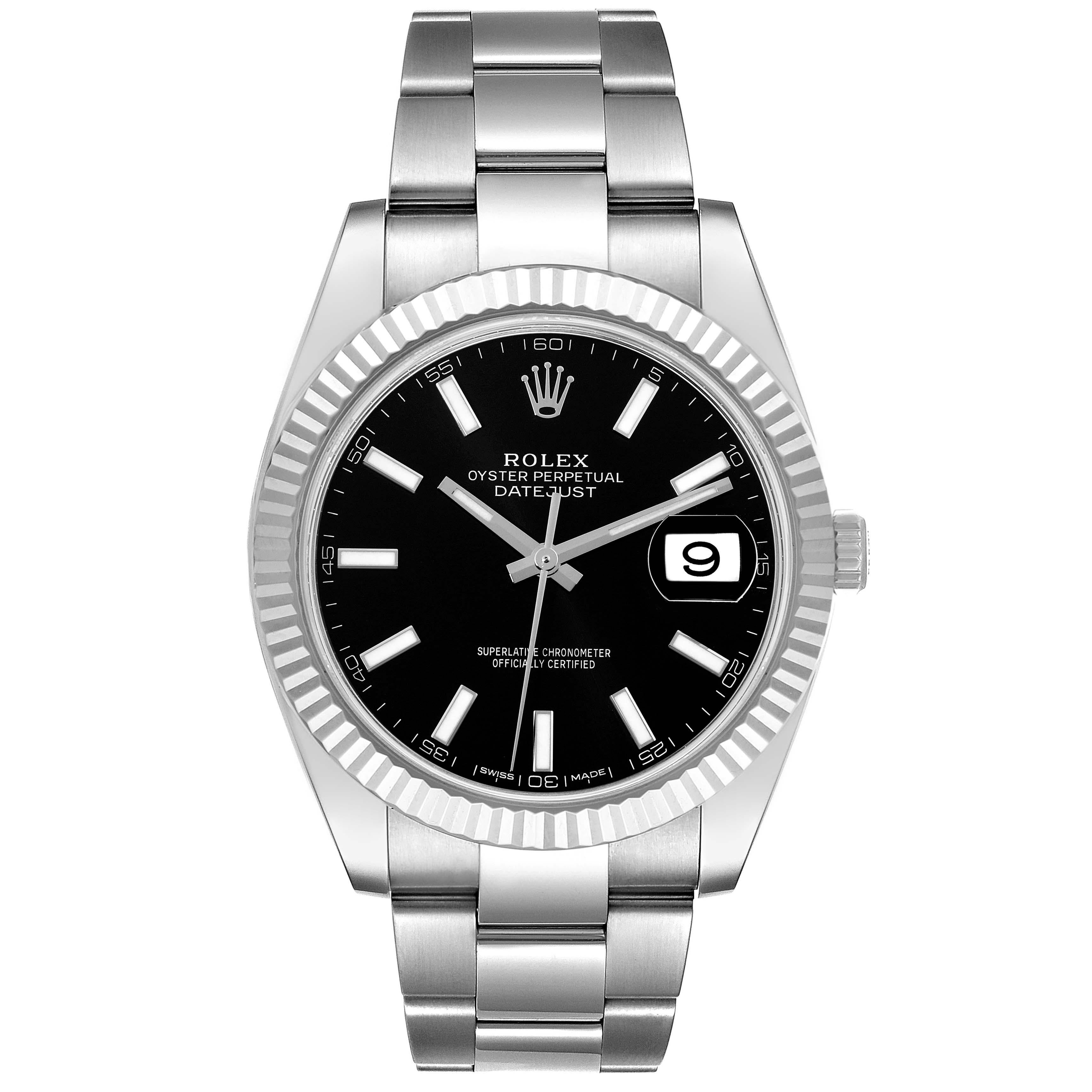 Rolex Datejust 41 Steel White Gold Black Dial Mens Watch 126334 Box Card. Officially certified chronometer automatic self-winding movement. Stainless steel case 41 mm in diameter. Rolex logo on the crown. 18K white gold fluted bezel. Scratch