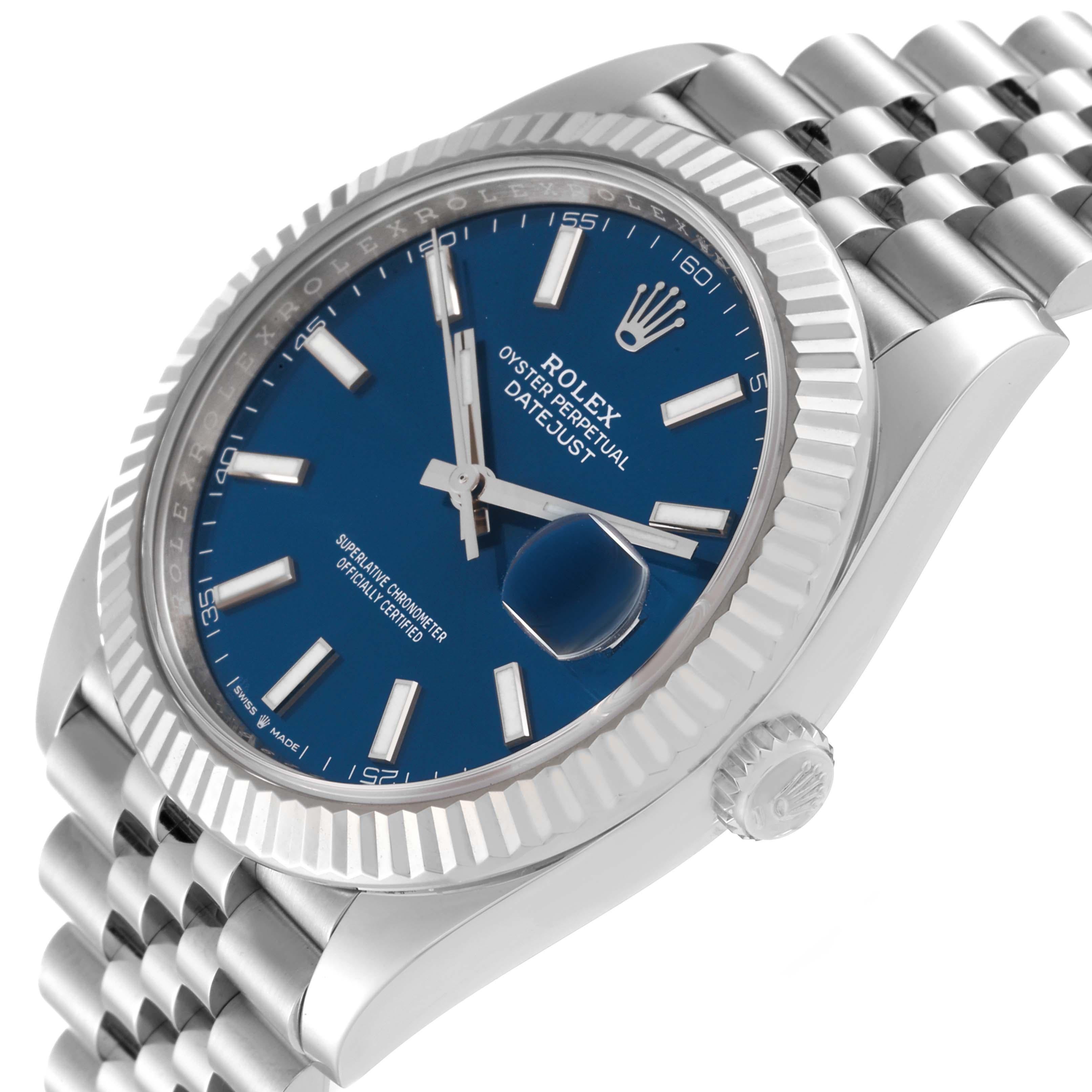 Rolex Datejust 41 Steel White Gold Blue Dial Mens Watch 126334 Box Card. Officially certified chronometer automatic self-winding movement. Stainless steel case 41 mm in diameter. Rolex logo on a crown. 18K white gold fluted bezel. Scratch resistant