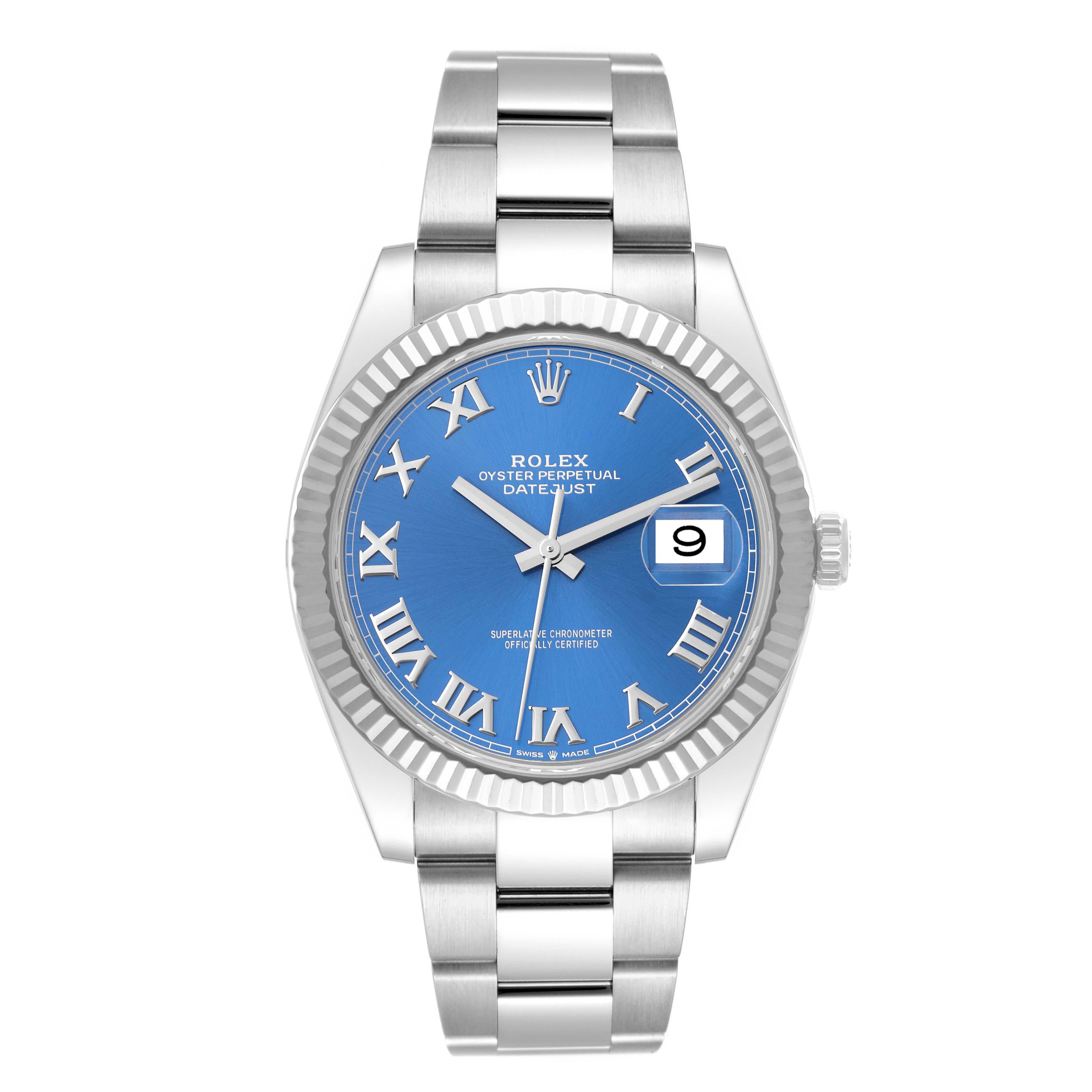 Rolex Datejust 41 Steel White Gold Blue Roman Dial Mens Watch 126334 Box Card. Officially certified chronometer automatic self-winding movement. Stainless steel case 41 mm in diameter. Rolex logo on the crown. 18K white gold fluted bezel. Scratch