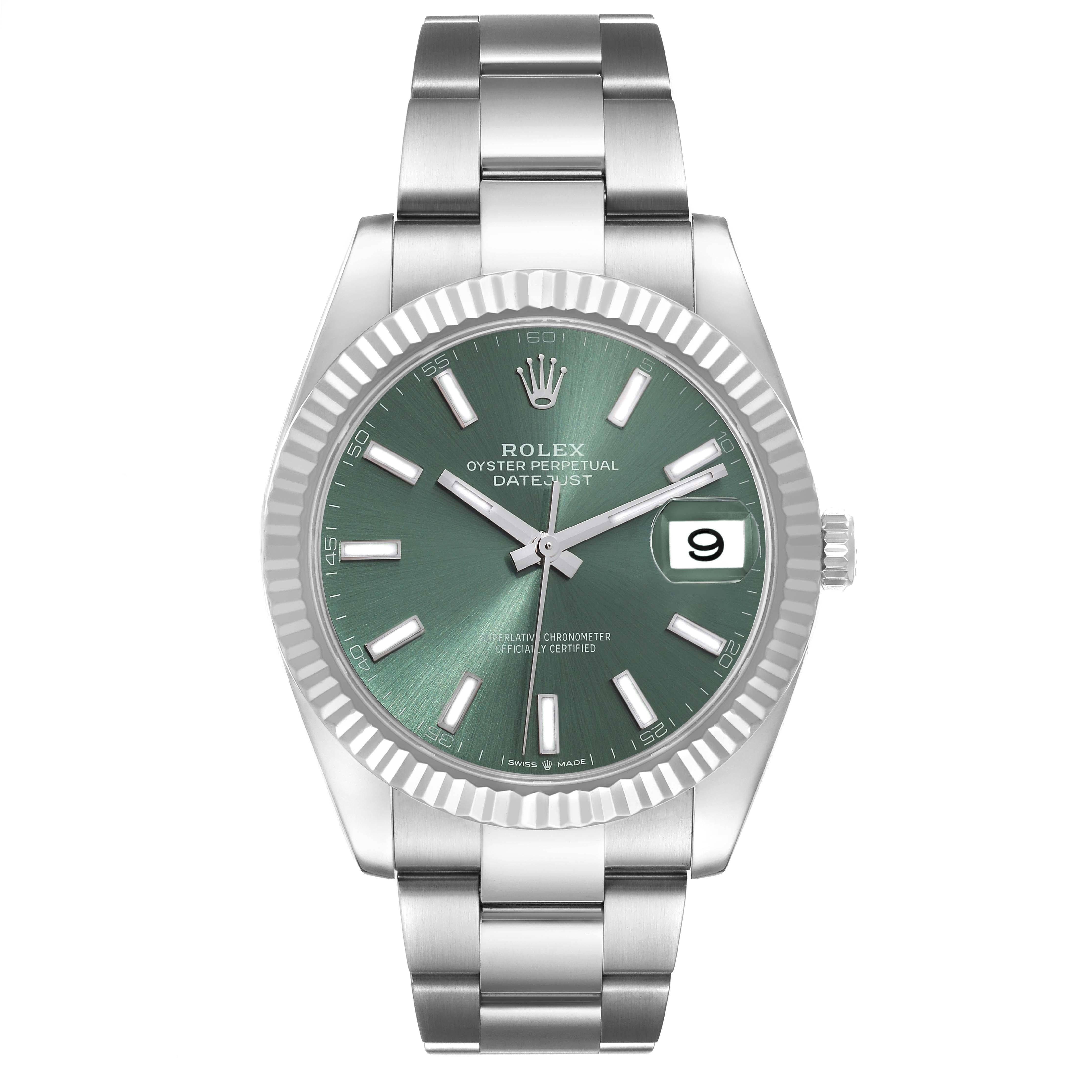 Rolex Datejust 41 Steel White Gold Mint Green Dial Mens Watch 126334. Officially certified chronometer automatic self-winding movement. Stainless steel case 41 mm in diameter. Rolex logo on a crown. 18k white gold fluted bezel. Scratch resistant