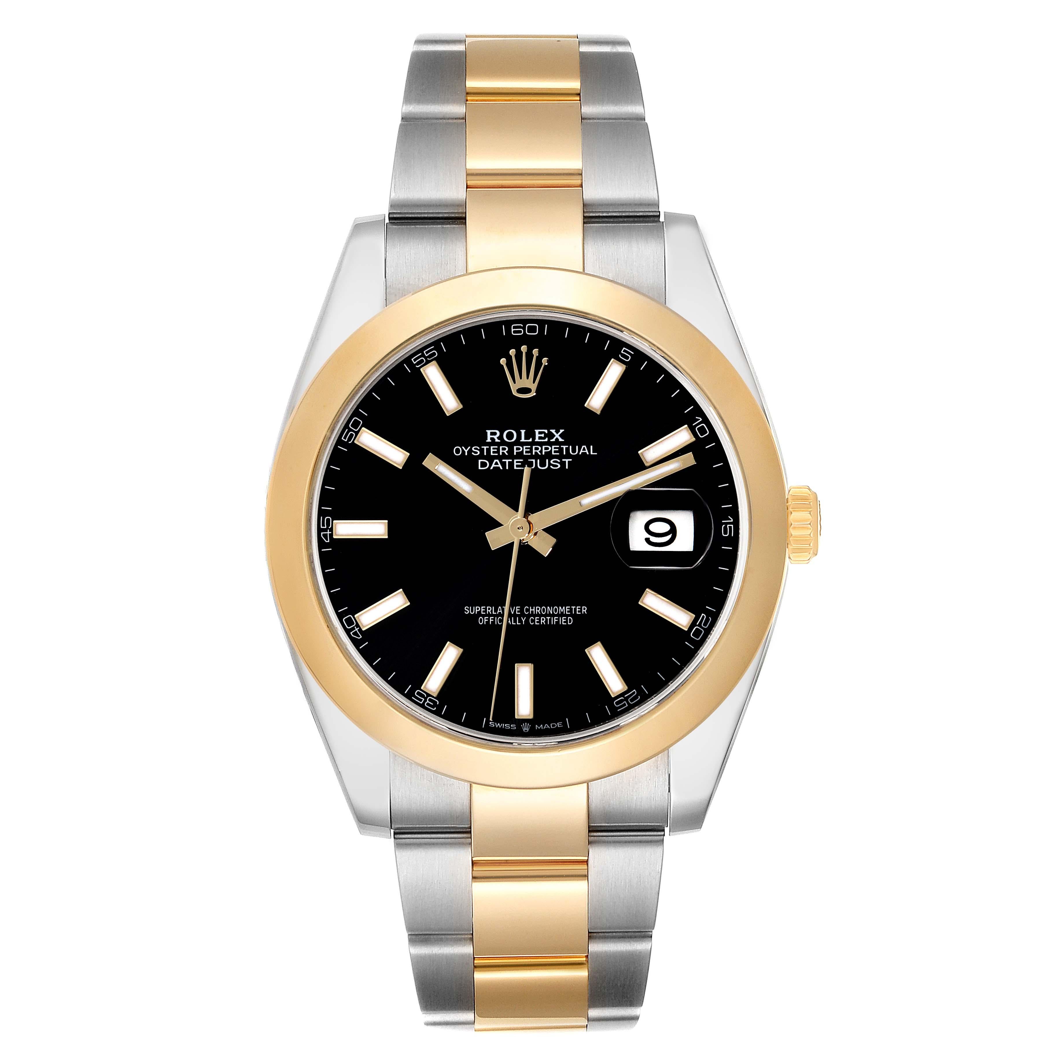 Rolex Datejust 41 Steel Yellow Gold Black Dial Mens Watch 126303 Box Card. Officially certified chronometer self-winding movement. Stainless steel and 18K yellow gold case 41.0 mm in diameter. Rolex logo on a crown. 18K yellow gold smooth domed