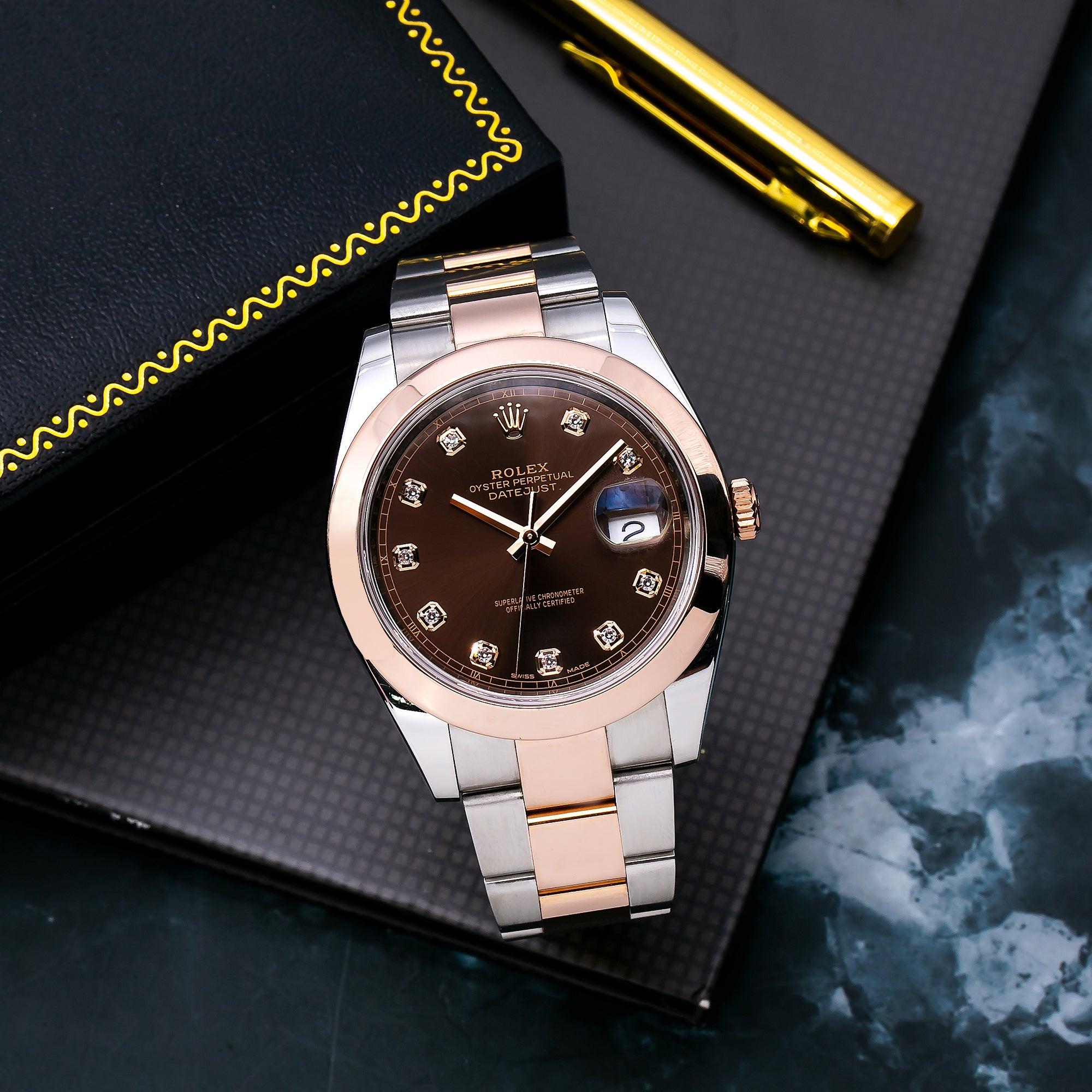 41mm case, 18K Everose gold screw-down crown, 18K Everose gold smooth bezel, scratch-resistant double anti-reflective sapphire crystal with cyclops lens over the date, chocolate dial, diamond hour markers, Rolex calibre 3235 perpetual self-winding