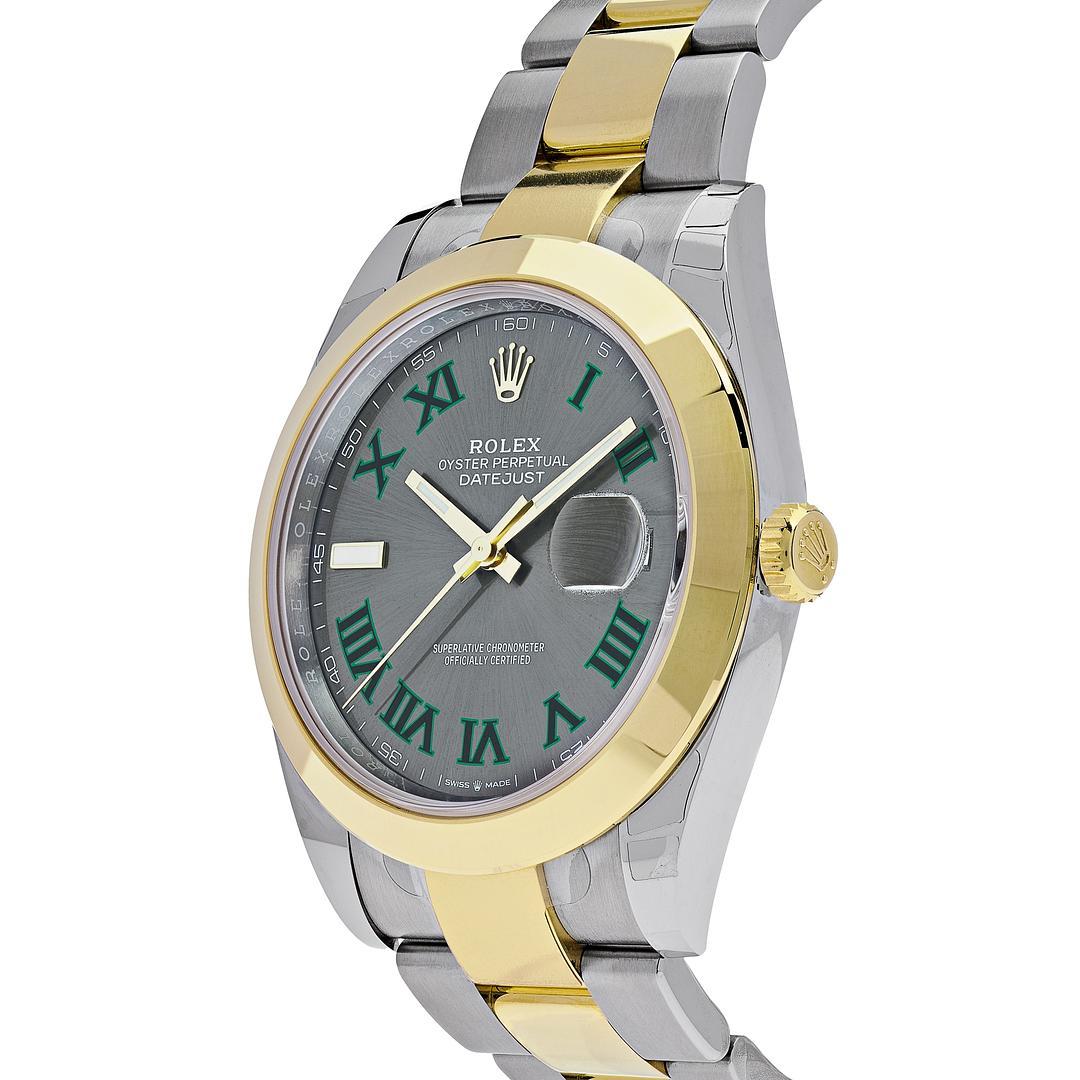The Rolex Datejust is designed with a 41mm stainless steel and yellow gold case, highlighted with a yellow gold smooth bezel. It features a slate grey dial with green Roman numerals, yellow gold hands and date display at 3 o'clock protected by a