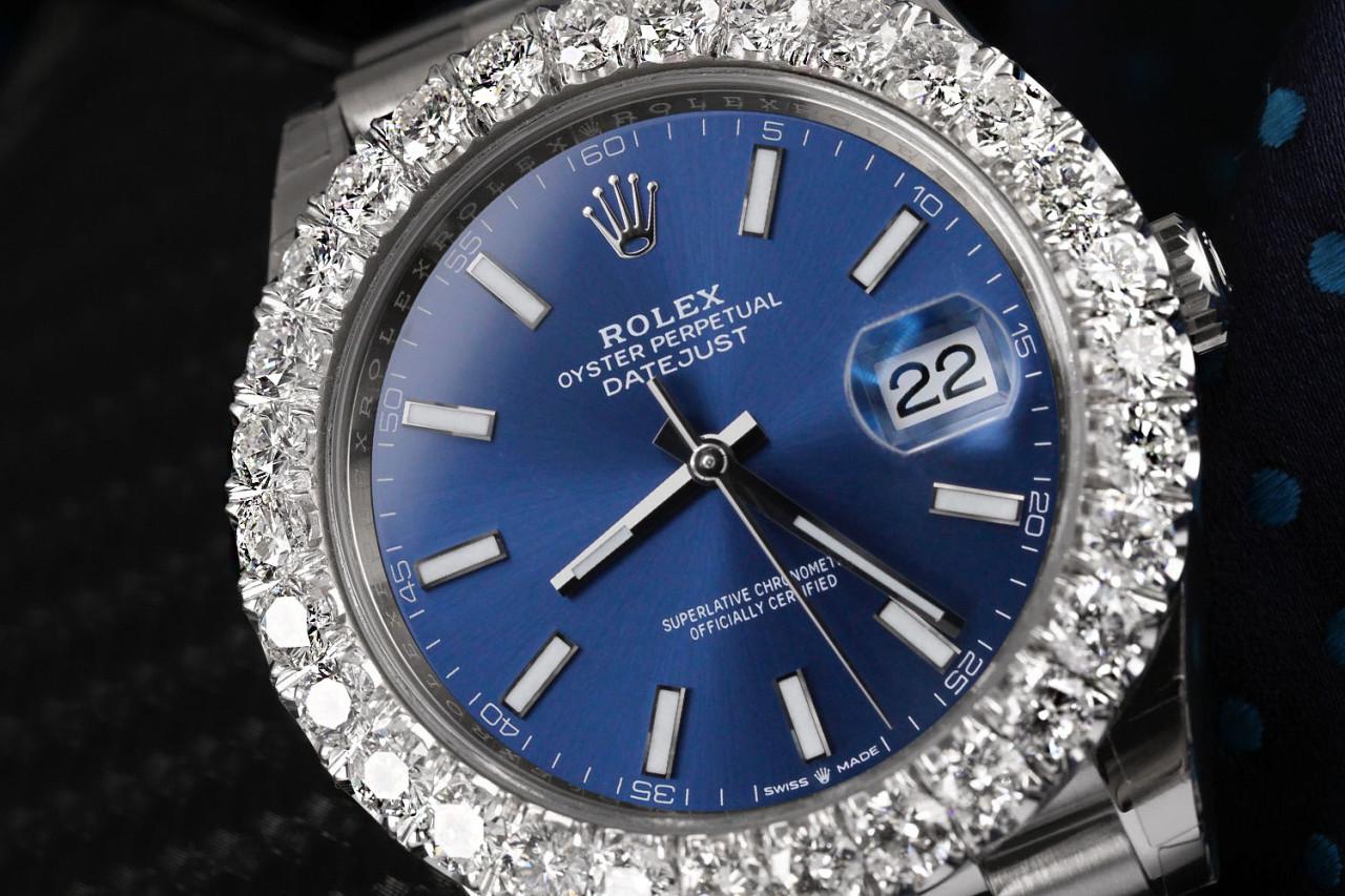 Rolex Oyster Perpetual Datejust Blue Dial Automatic Mens Jubilee Watch 126300RSJ.

Silver-tone stainless steel case with a silver-tone stainless steel Rolex jubilee bracelet. Fixed silver-tone stainless steel bezel. Blue dial with silver-tone hands