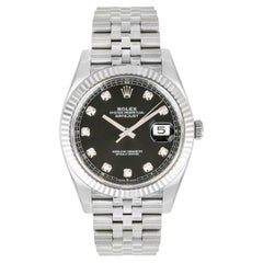 Rolex Datejust 41 mm, cadran noir diamanté, bracelet Jubilee, lunette cannelée, référence 126334