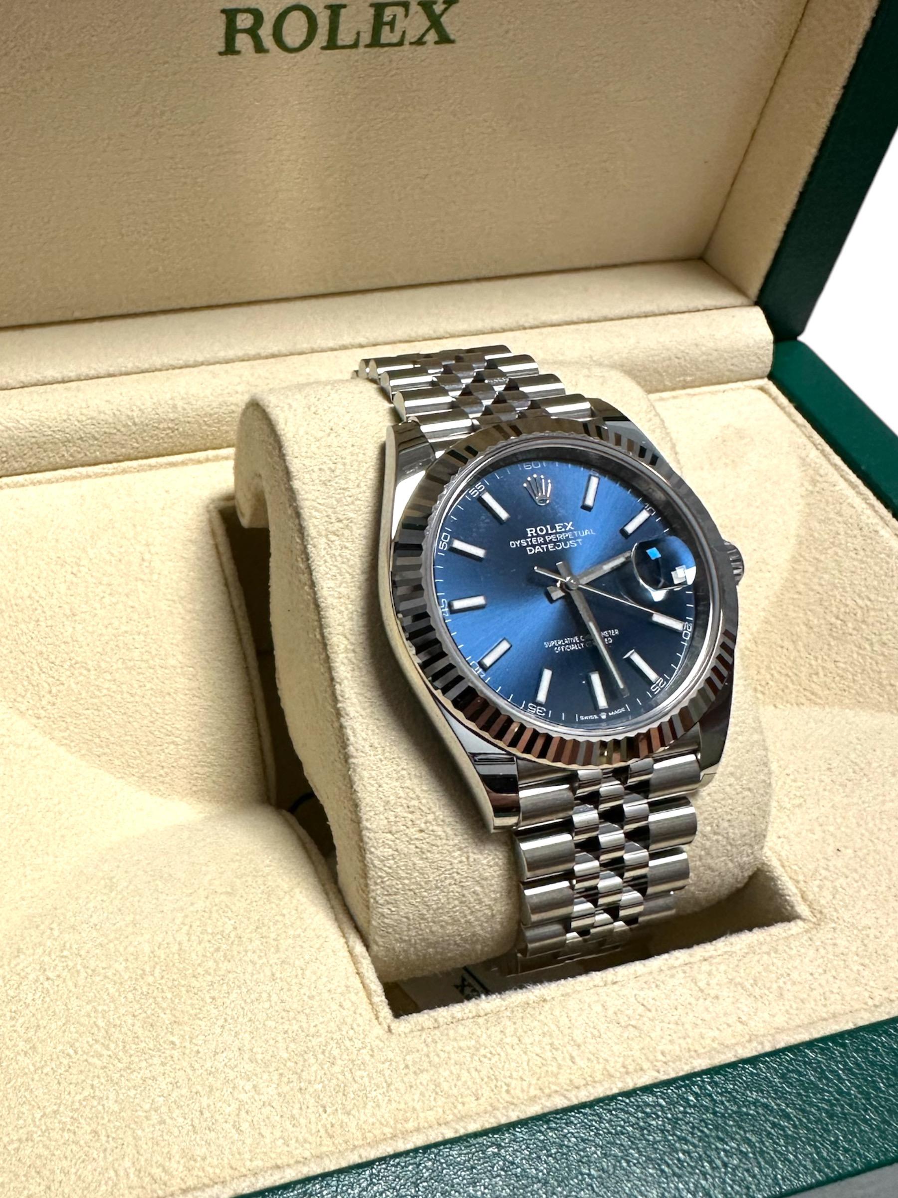 Rolex Datejust 41mm Blue Stick Dial Fluted Jubilee Bracelet Brand New & Unworn 126334 Watch

This is a complete set and includes original Rolex warranty card, booklets, box and outer boxer.

Reference # 126334
Condition: NEW/UNWORN
Bracelet: