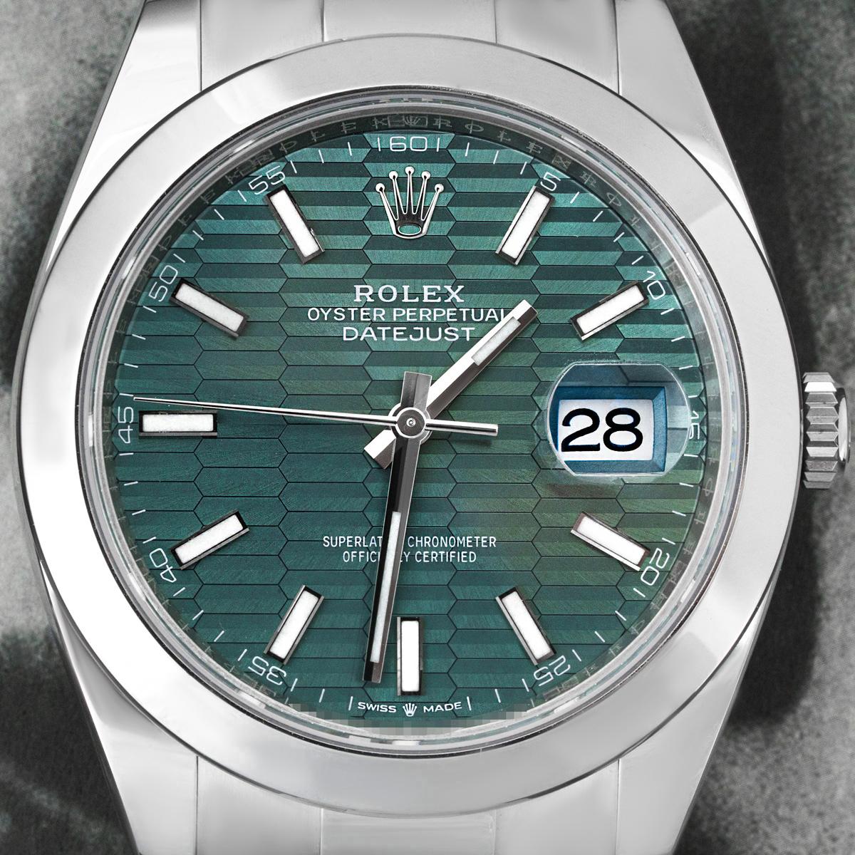 An unworn 41mm stainless steel Datejust by Rolex. Featuring a distinctive mint green fluted motif dial with applied hour markers and a smooth fixed steel bezel. Fitted with a sapphire glass, a self-winding automatic movement and an Oyster bracelet