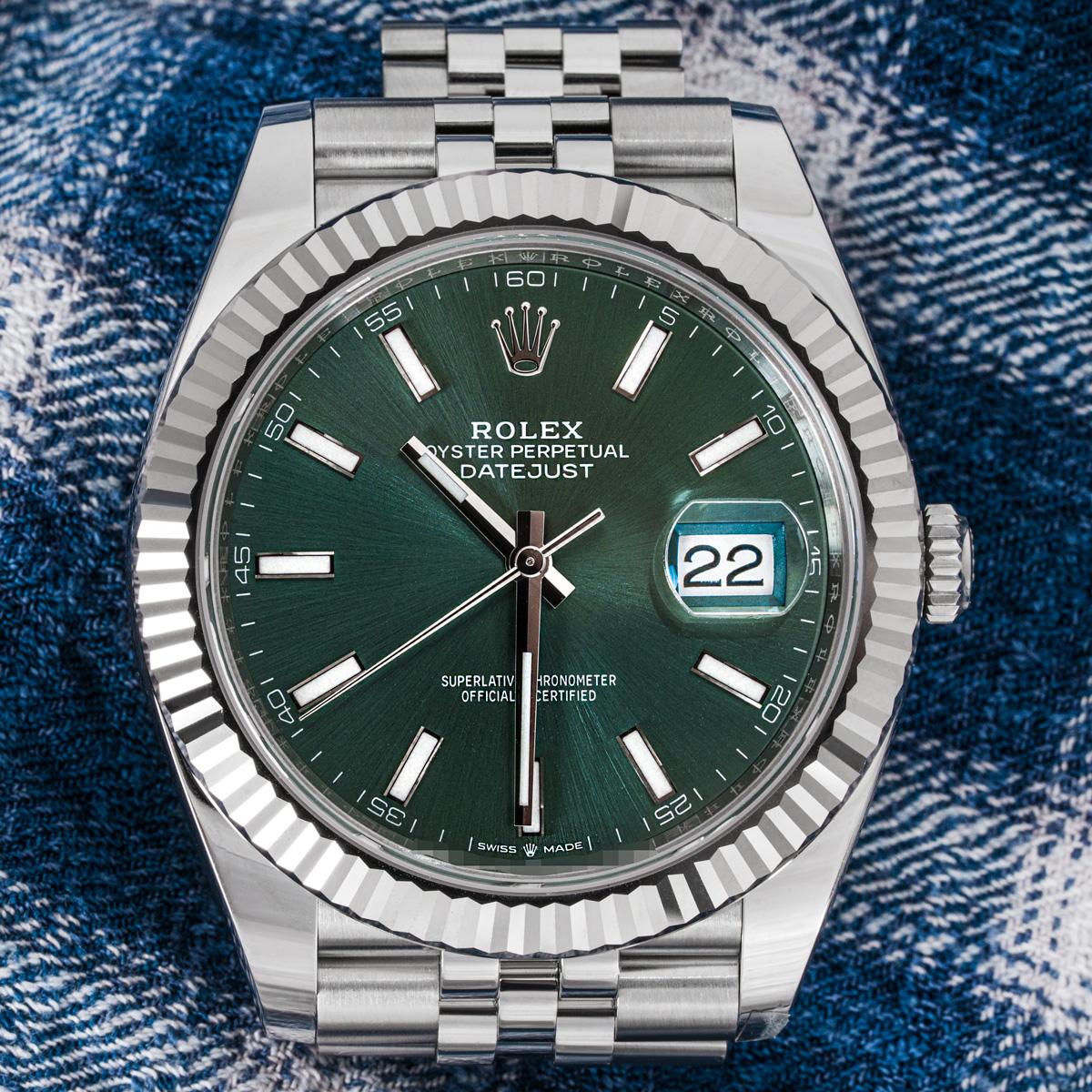 An Oystersteel 41mm Datejust by Rolex. Featuring the mint green dial and a white gold fluted bezel. Presented on a Jubilee bracelet with the Oysterclasp, featuring the 5mm extension link. The watch is fitted with scratch-resistant sapphire crystal