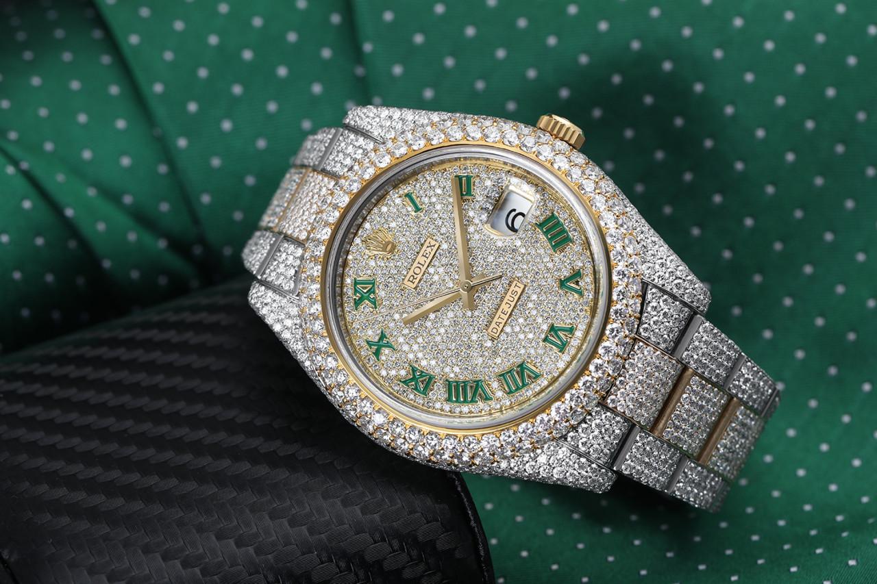Rolex Datejust 126303 Stainless Steel and 18k Yellow Gold Custom Fully Iced Out Watch Green Roman Dial

This watch comes with a LIFETIME diamond replacement warranty. We are so confident in our diamonds setters that if any of the individual diamonds